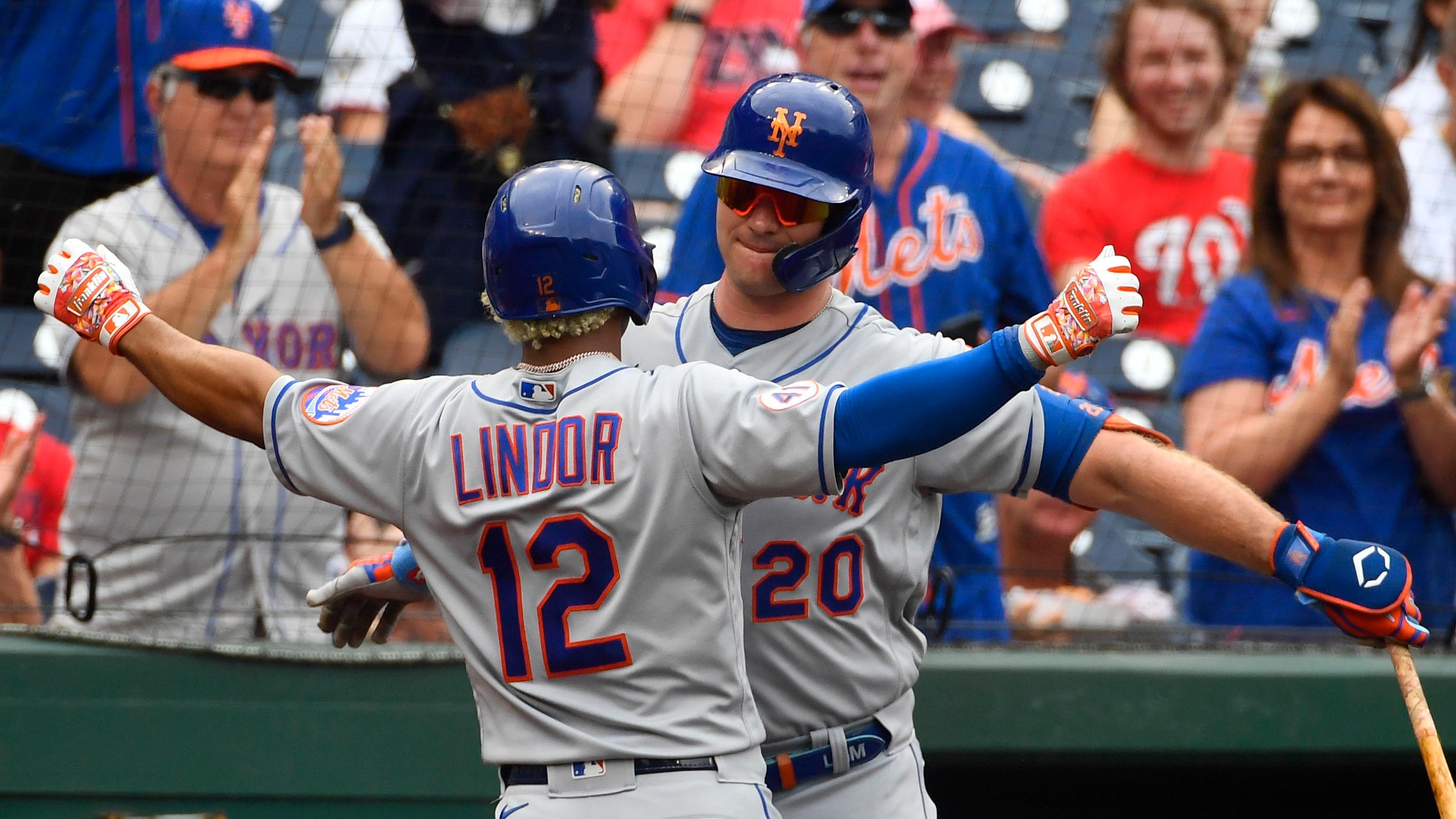 Jun 19, 2021; Washington, District of Columbia, USA; New York Mets shortstop Francisco Lindor (12) is congratulated by first baseman Pete Alonso (20) after hitting a two run home run against the Washington Nationals during the first inning at Nationals Park. / Brad Mills-USA TODAY Sports