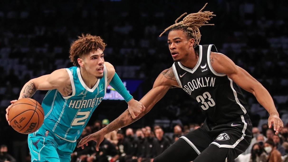 Oct 24, 2021; Brooklyn, New York, USA; Charlotte Hornets guard LaMelo Ball (2) and Brooklyn Nets forward Nic Claxton (33) at Barclays Center. / Wendell Cruz-USA TODAY Sports