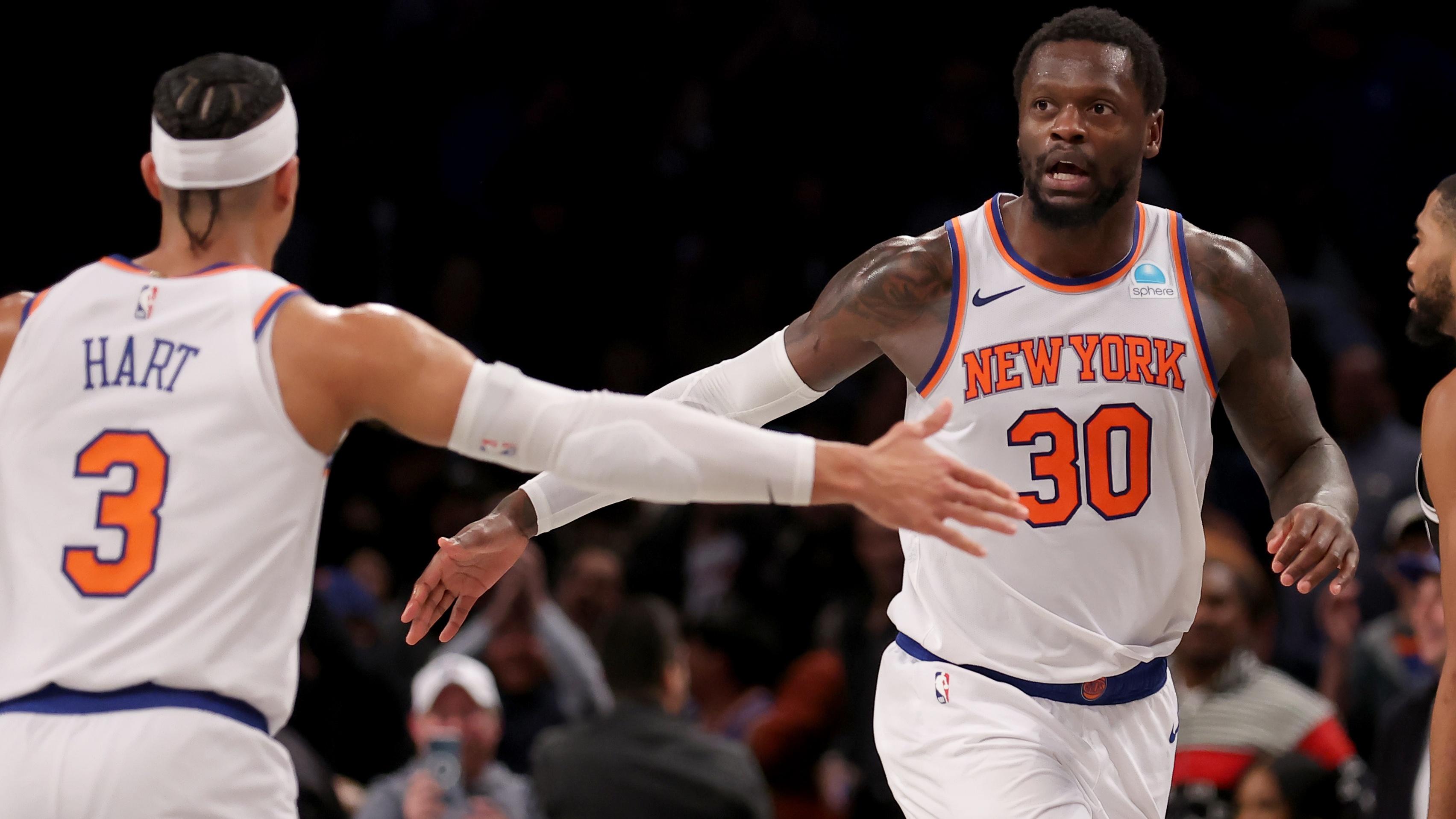 New York Knicks forward Julius Randle (30) high fives guard Josh Hart (3) in front of Brooklyn Nets forward Mikal Bridges (1) during the fourth quarter at Barclays Center / Brad Penner - USA TODAY Sports