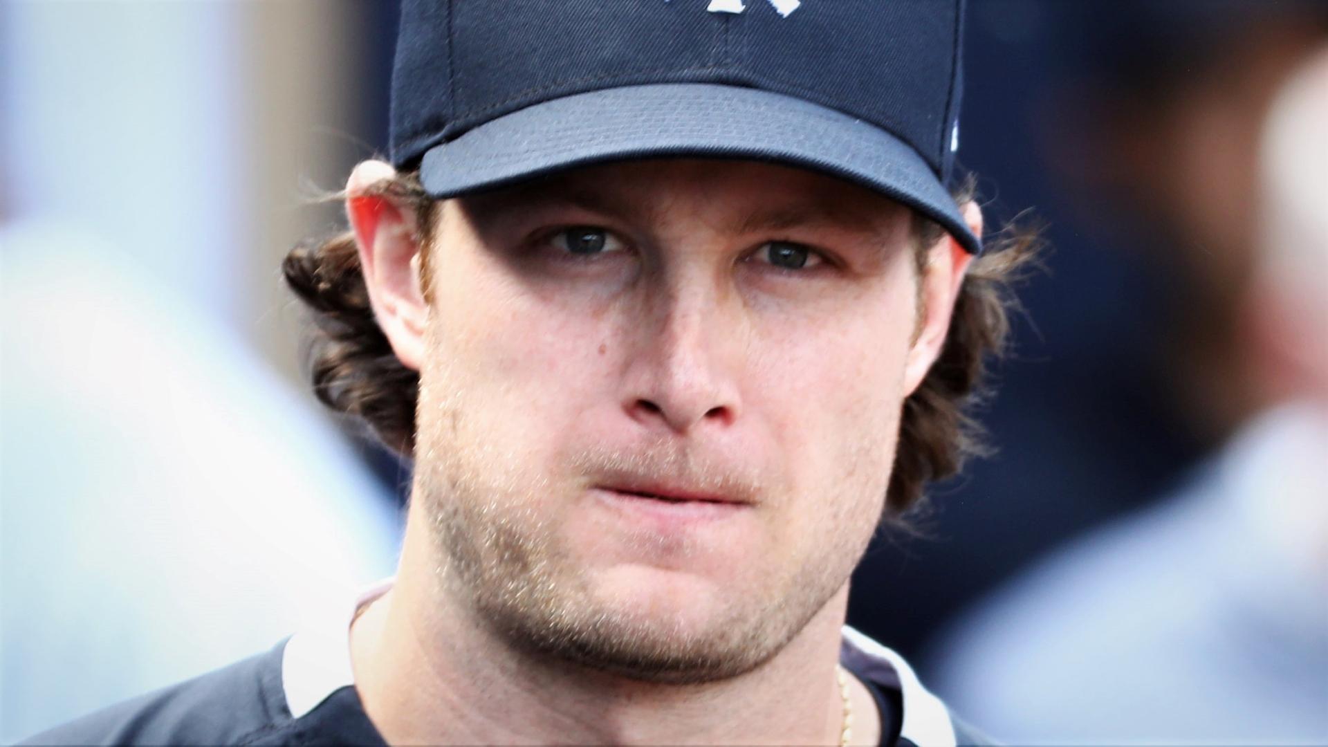 Mar 8, 2020; Tampa, Florida, USA; New York Yankees pitcher Gerrit Cole (45) looks on in the dugout against the Atlanta Braves at George M. Steinbrenner Field. Mandatory Credit: Kim Klement-USA TODAY Sports / © Kim Klement-USA TODAY Sports