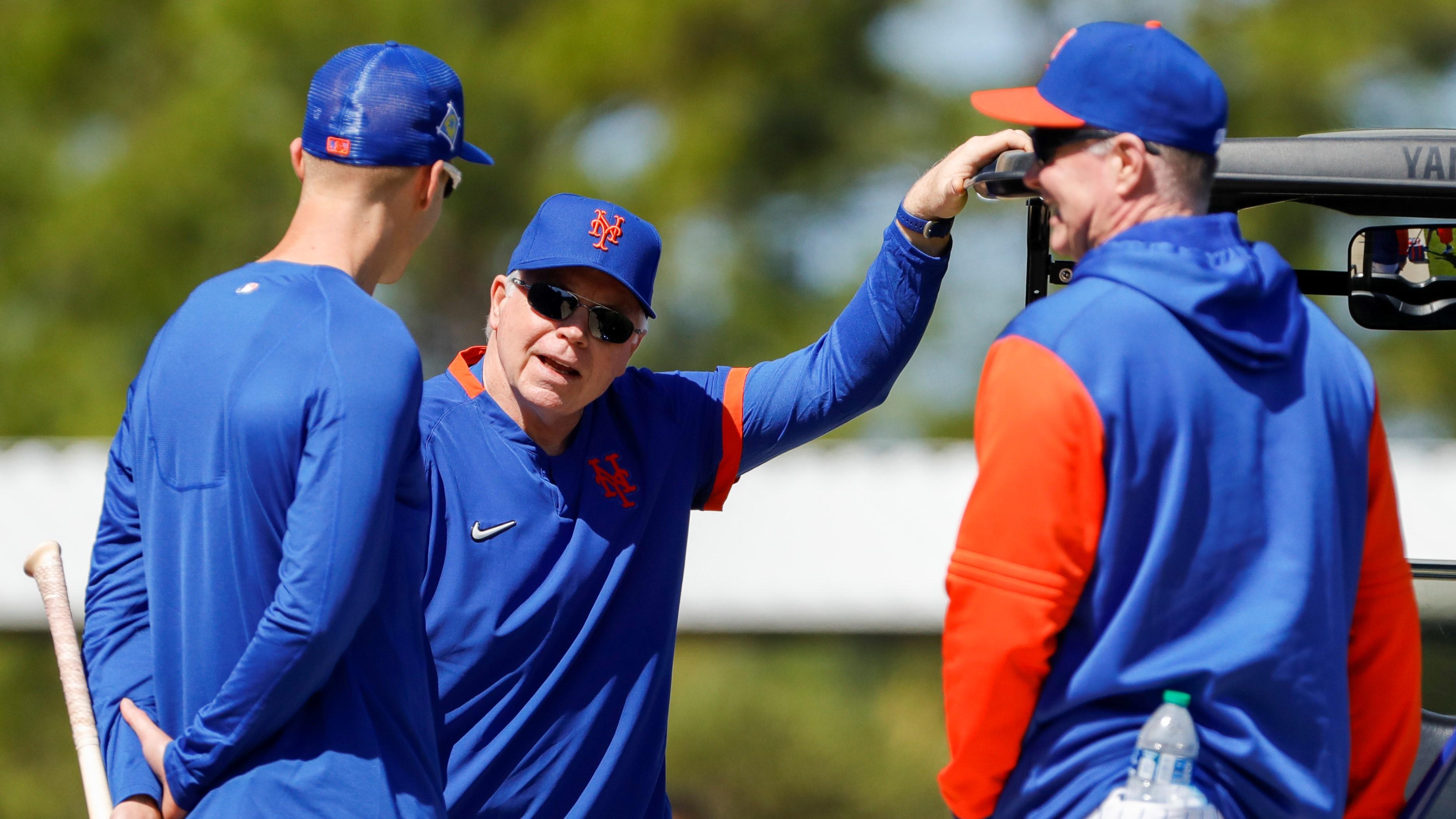Mar 13, 2022; Port St. Lucie, FL, USA; New York Mets manager Buck Showalter (middle) talks to outfielder Mark Canha (left) and bench coach Glenn Sherlock after a workout during spring training. / Sam Navarro-USA TODAY Sports