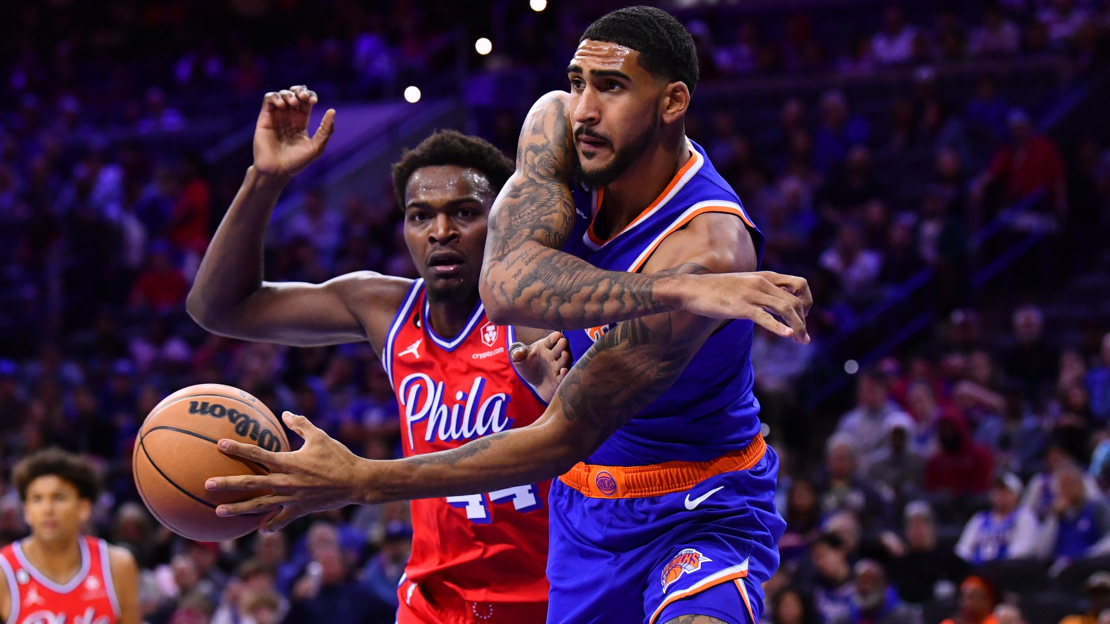 Knicks forward Obi Toppin (1) passes across Philadelphia 76ers forward Paul Reed (44) in the second quarter at Wells Fargo Center / Kyle Ross - USA TODAY Sports