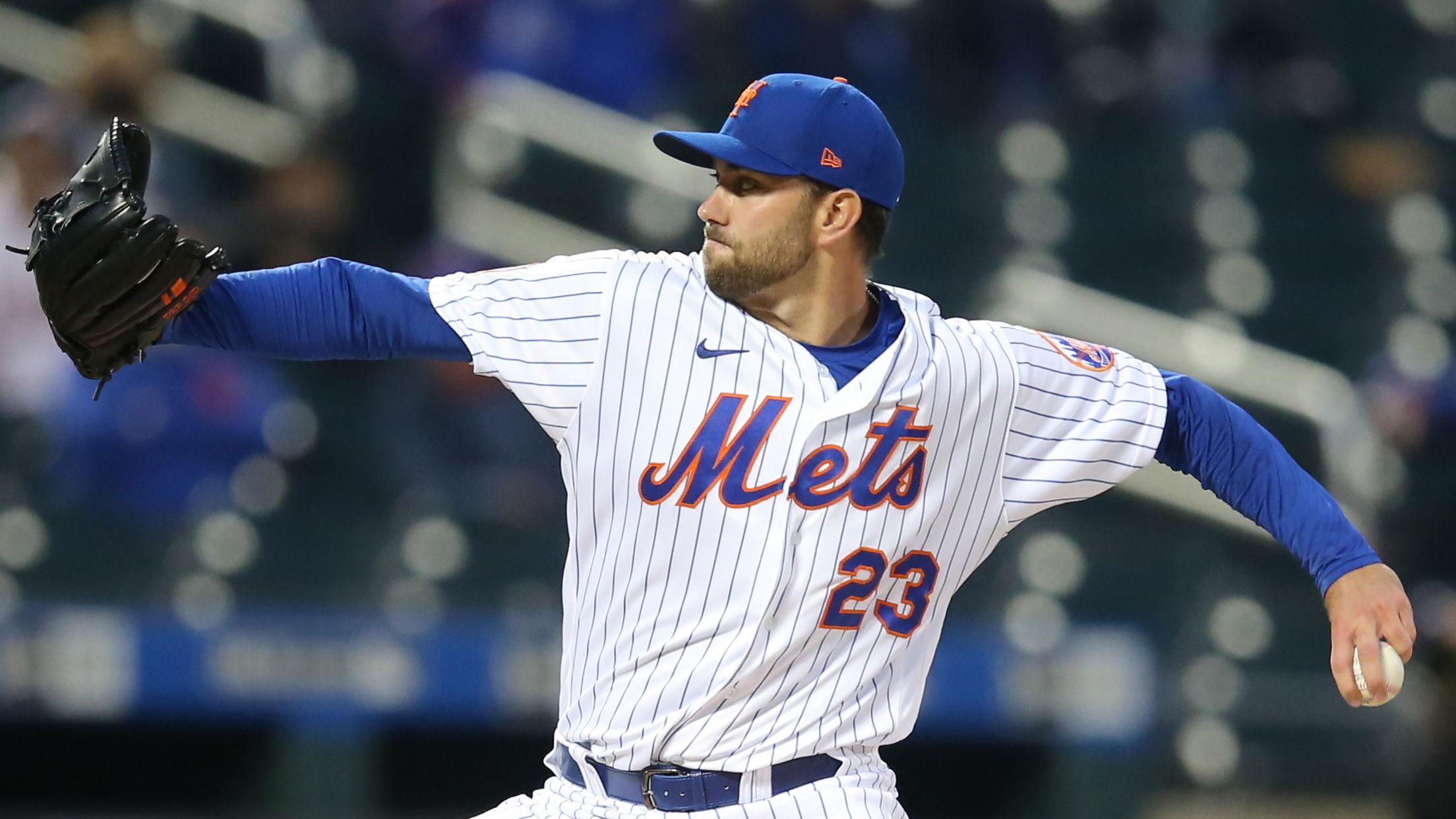 Apr 14, 2021; New York City, New York, USA; New York Mets starting pitcher David Peterson (23) pitches against the Philadelphia Phillies during the first inning at Citi Field. / Brad Penner-USA TODAY Sports
