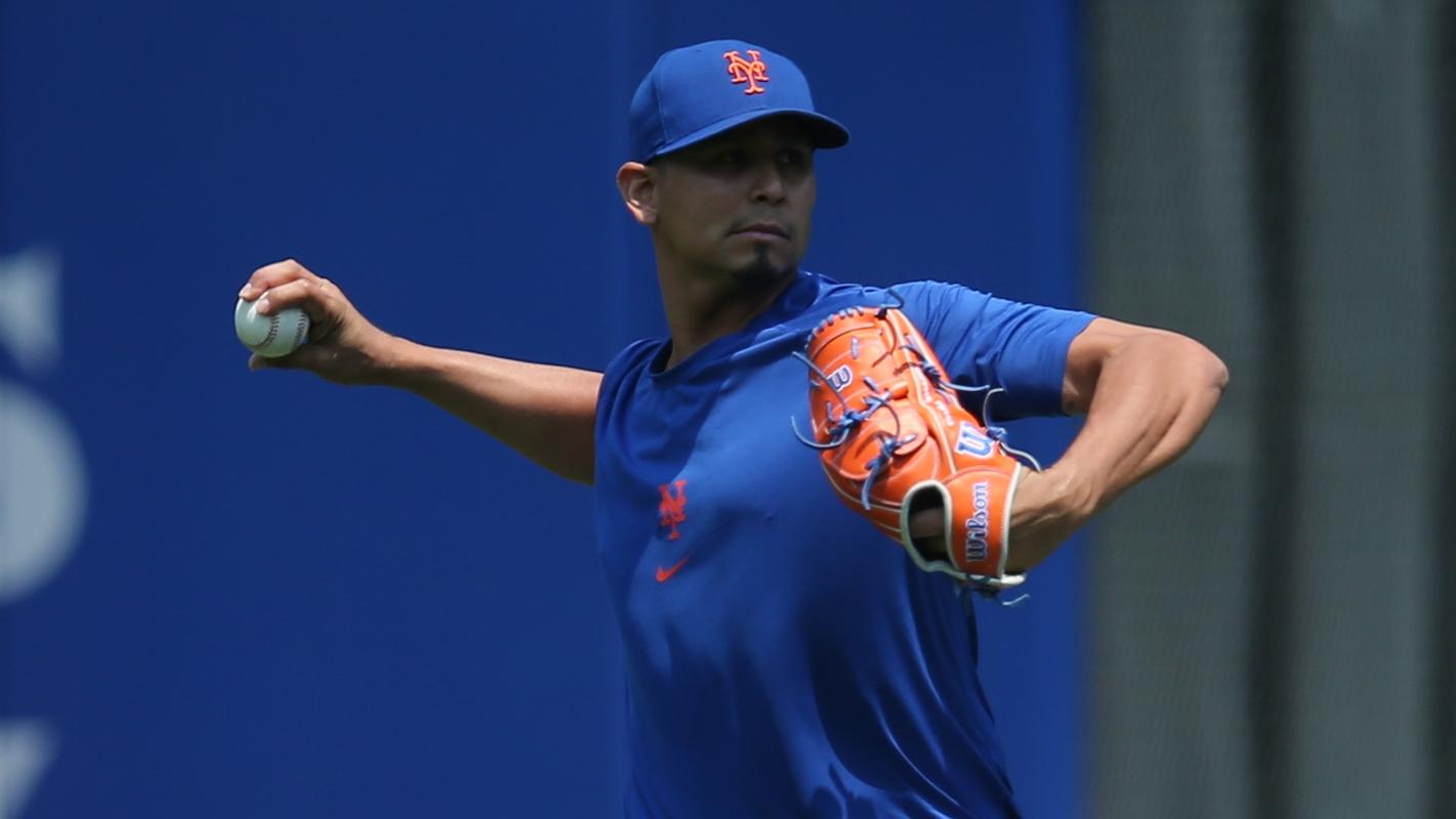 Jul 7, 2021; New York City, New York, USA; New York Mets injured starting pitcher Carlos Carrasco (59) works out in the outfield before a double header against the Milwaukee Brewers at Citi Field. / Brad Penner-USA TODAY Sports