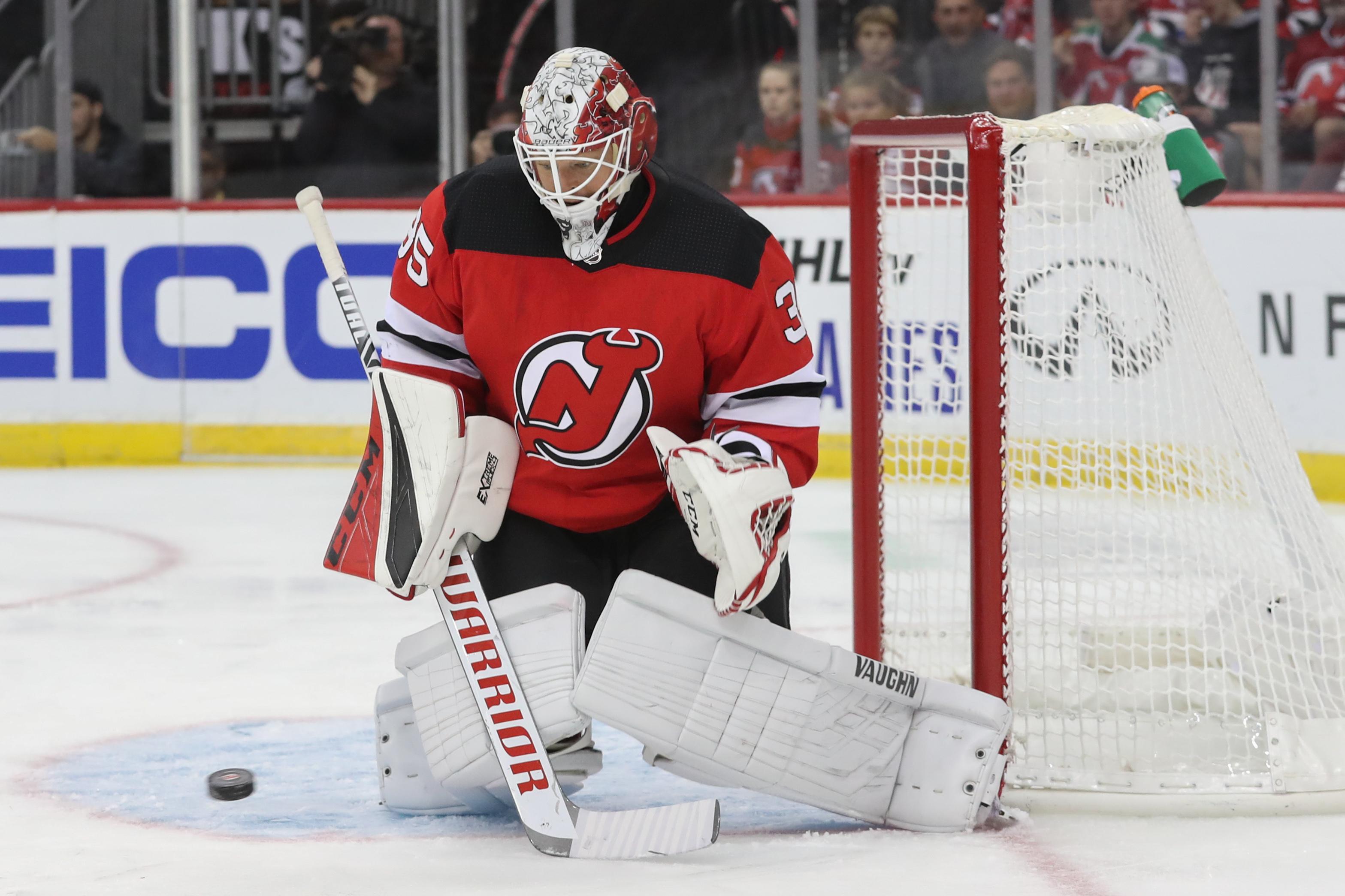 Oct 14, 2019; Newark, NJ, USA; New Jersey Devils goaltender Cory Schneider (35) makes a save during the first period of their game against the Florida Panthers at Prudential Center. Mandatory Credit: Ed Mulholland-USA TODAY Sports / © Ed Mulholland-USA TODAY Sports