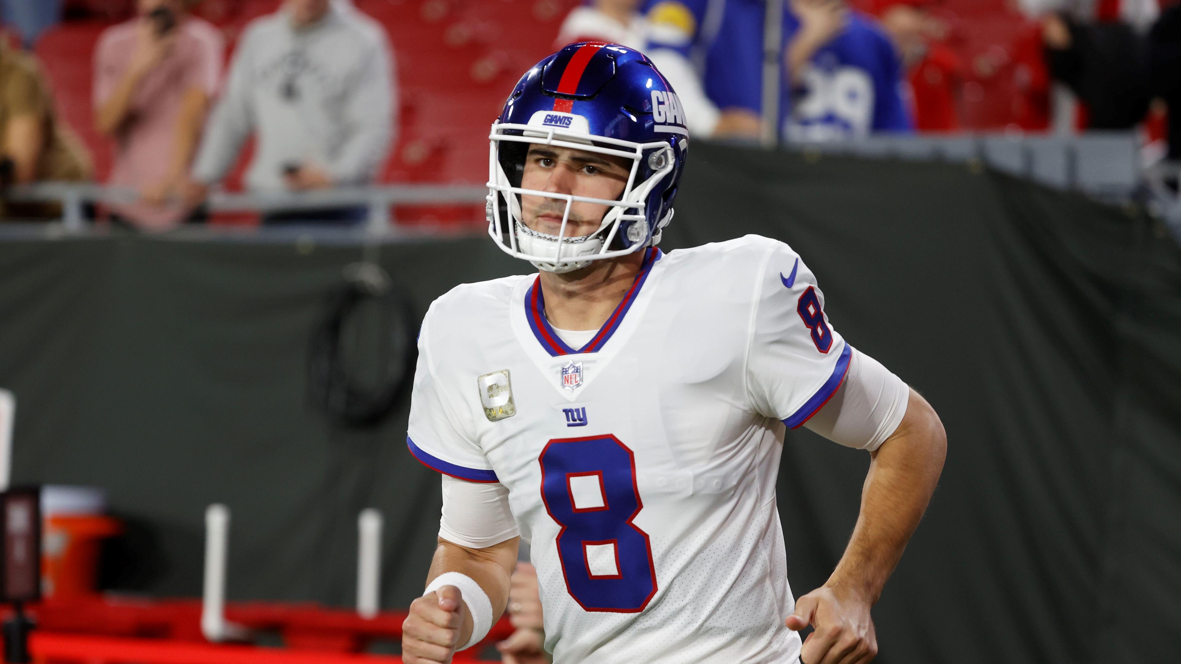 New York Giants quarterback Daniel Jones (8) runs out prior to the game against the Tampa Bay Buccaneers at Raymond James Stadium. / Kim Klement-USA TODAY Sports
