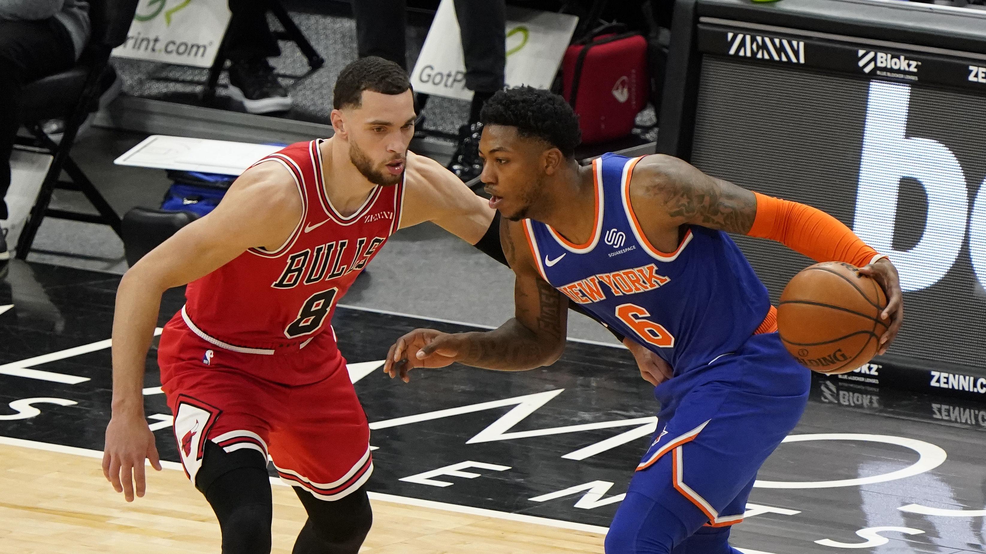 Feb 3, 2021; Chicago, Illinois, USA; New York Knicks guard Elfrid Payton (6) dribbles the ball against Chicago Bulls guard Zach LaVine (8) during the first quarter at the United Center. Mandatory Credit: Mike Dinovo-USA TODAY Sports / © Mike Dinovo-USA TODAY Sports
