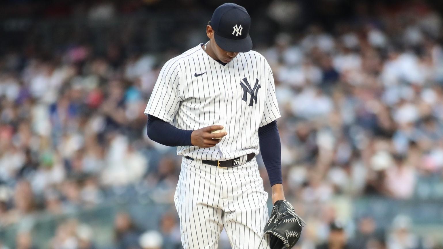 Aug 18, 2023; Bronx, New York, USA; New York Yankees starting pitcher Jhony Brito (76) stands on the mound after giving up a three run home run in the first inning against the Boston Red Sox at Yankee Stadium. / Wendell Cruz-USA TODAY Sports