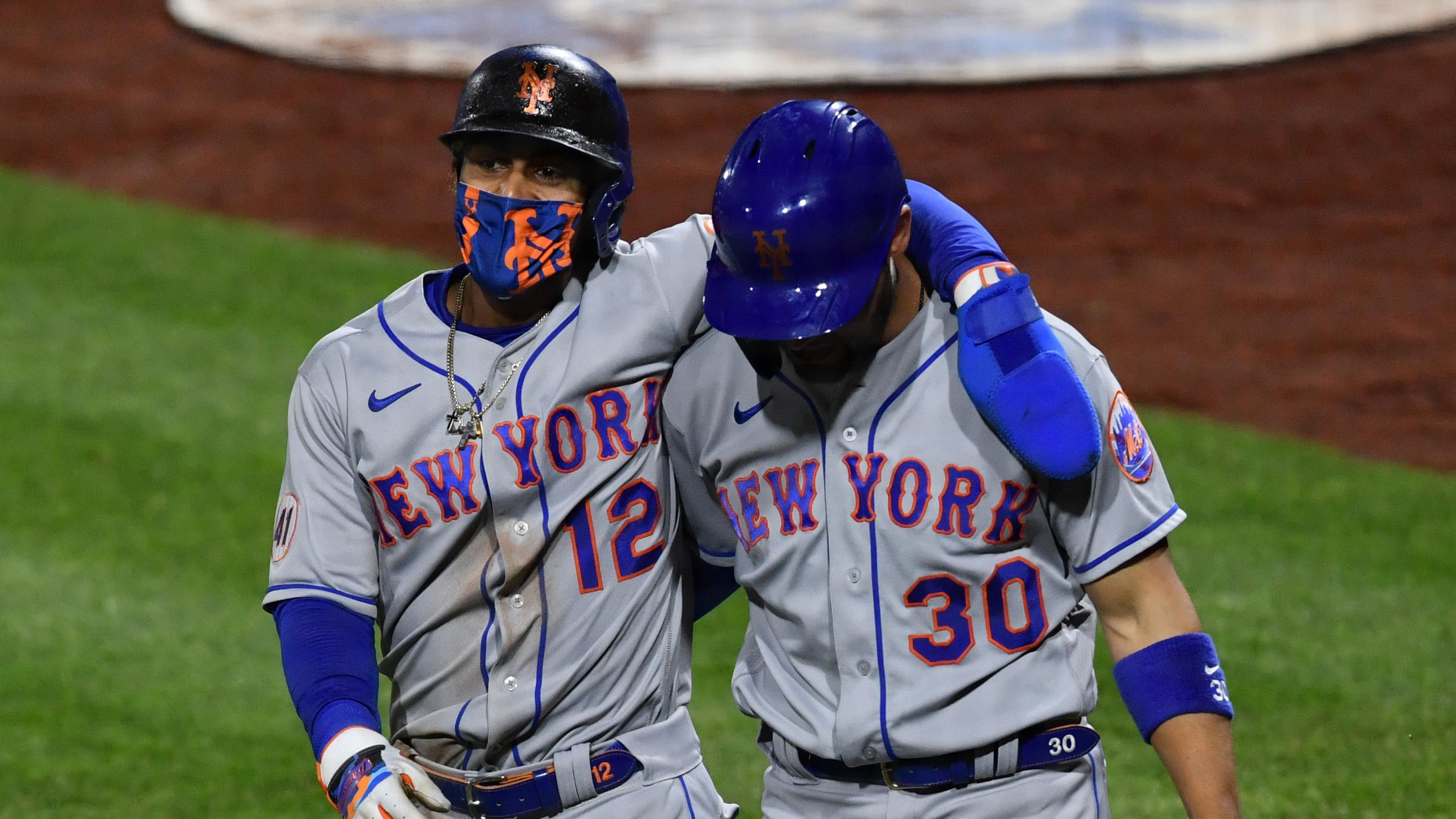 May 2, 2021; Philadelphia, Pennsylvania, USA; New York Mets shortstop Francisco Lindor (12) and right fielder Michael Conforto (30) walk off the field after scoring in the eighth inning against the Philadelphia Phillies at Citizens Bank Park. / Kyle Ross-USA TODAY Sports