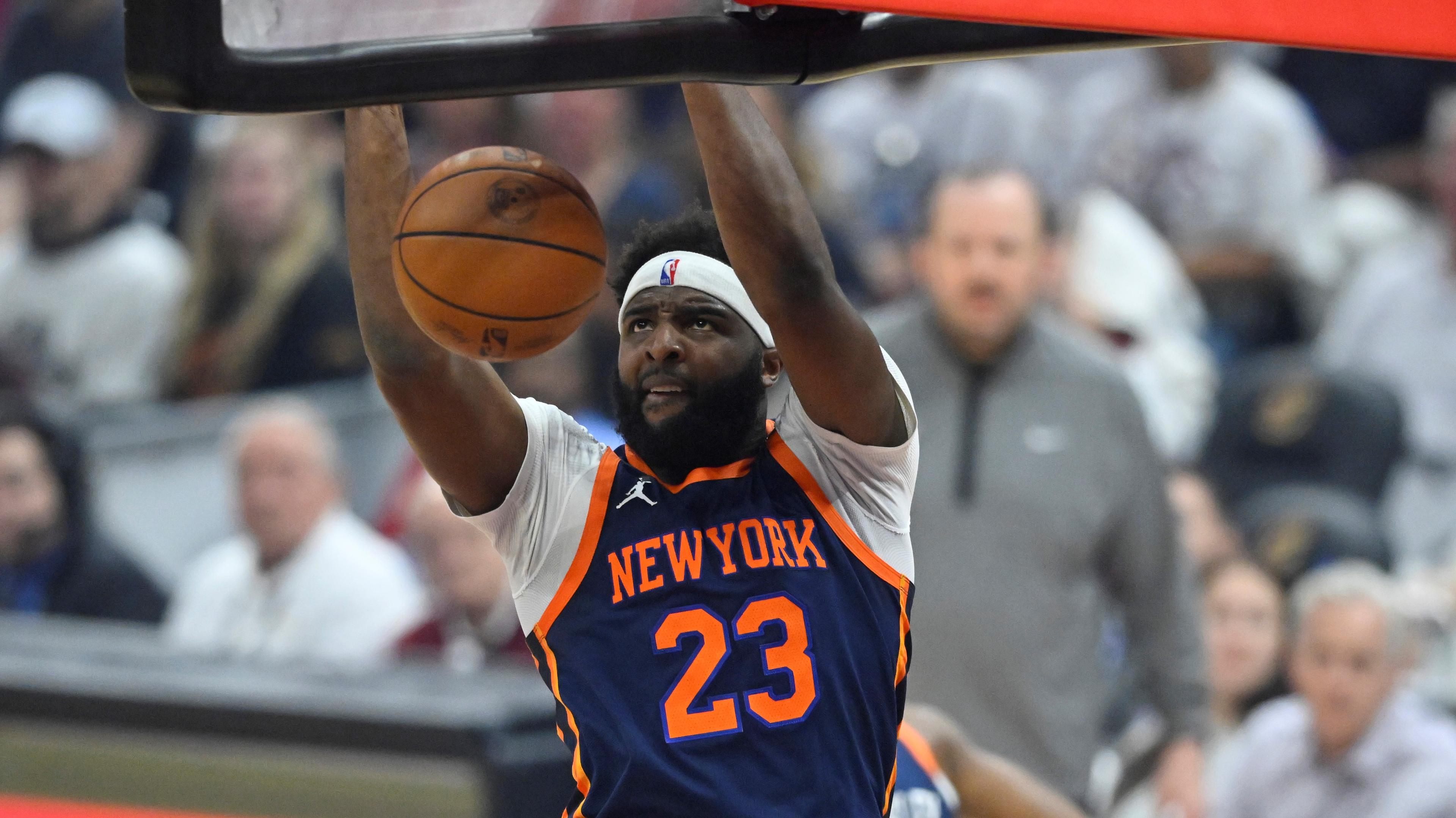 Apr 15, 2023; Cleveland, Ohio, USA; New York Knicks center Mitchell Robinson (23) dunks against the Cleveland Cavaliers in the first quarter of game one of the 2023 NBA playoffs at Rocket Mortgage FieldHouse. Mandatory Credit: David Richard-USA TODAY Sports / © David Richard-USA TODAY Sports