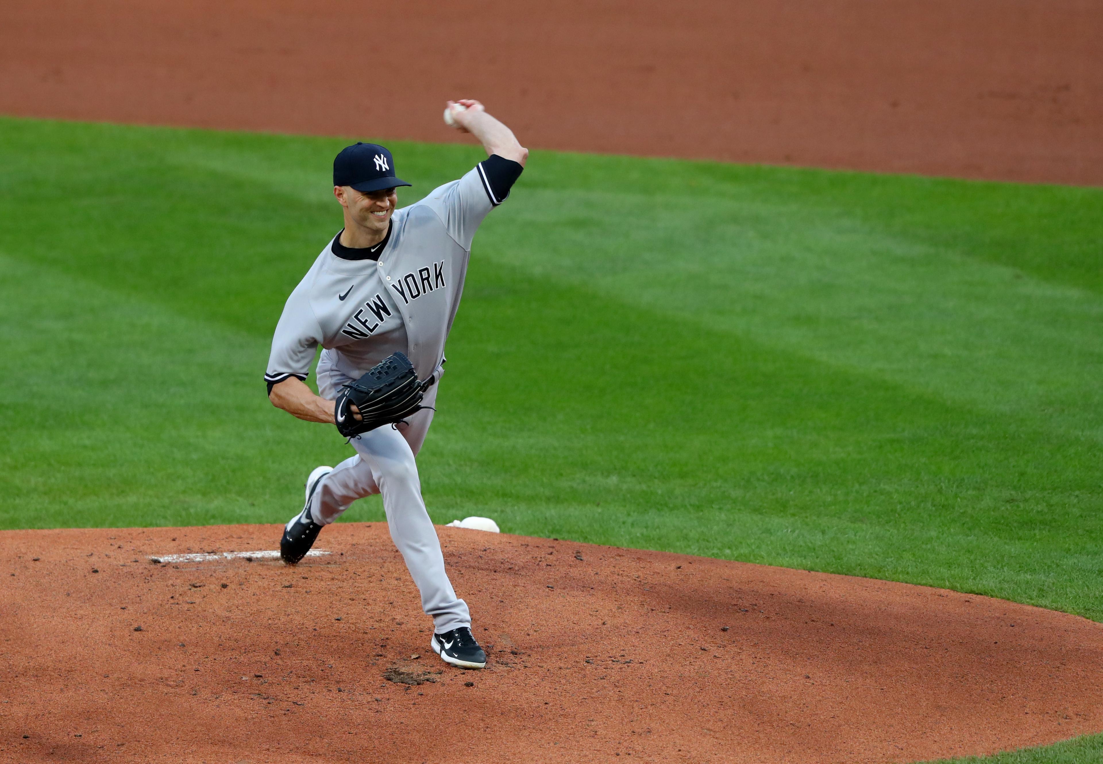 Sep 8, 2020; Buffalo, New York, USA; New York Yankees starting pitcher J.A. Happ (33) throws a pitch during the first inning against the Toronto Blue Jays at Sahlen Field. Mandatory Credit: Timothy T. Ludwig-USA TODAY Sports / © Timothy T. Ludwig-USA TODAY Sports
