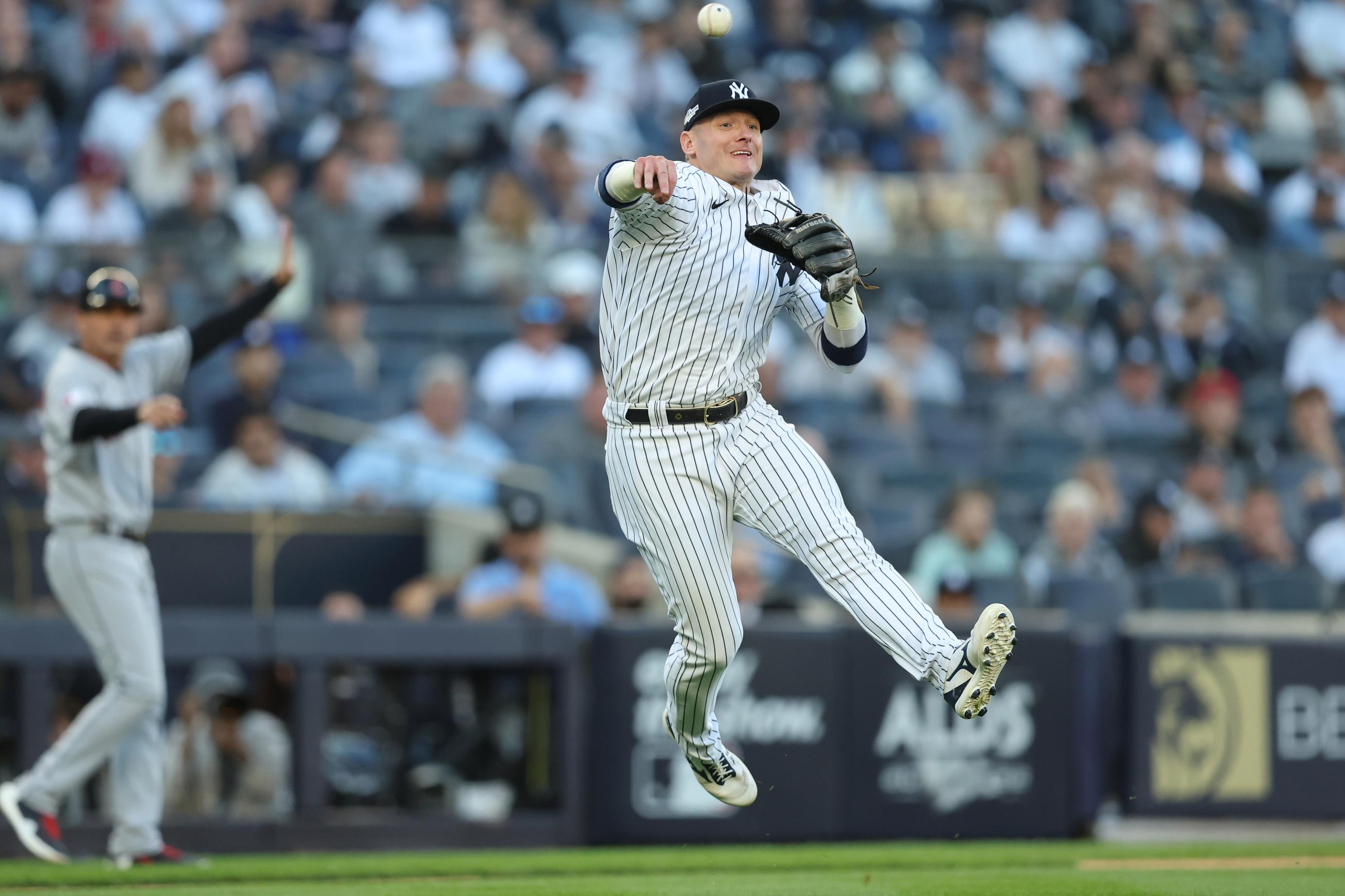 New York Yankees third baseman Josh Donaldson (28) throws to first base to force out Cleveland Guardians designated hitter Owen Miller (not pictured) during the tenth inning in game two of the ALDS for the 2022 MLB Playoffs at Yankee Stadium. / Brad Penner-USA TODAY Sports