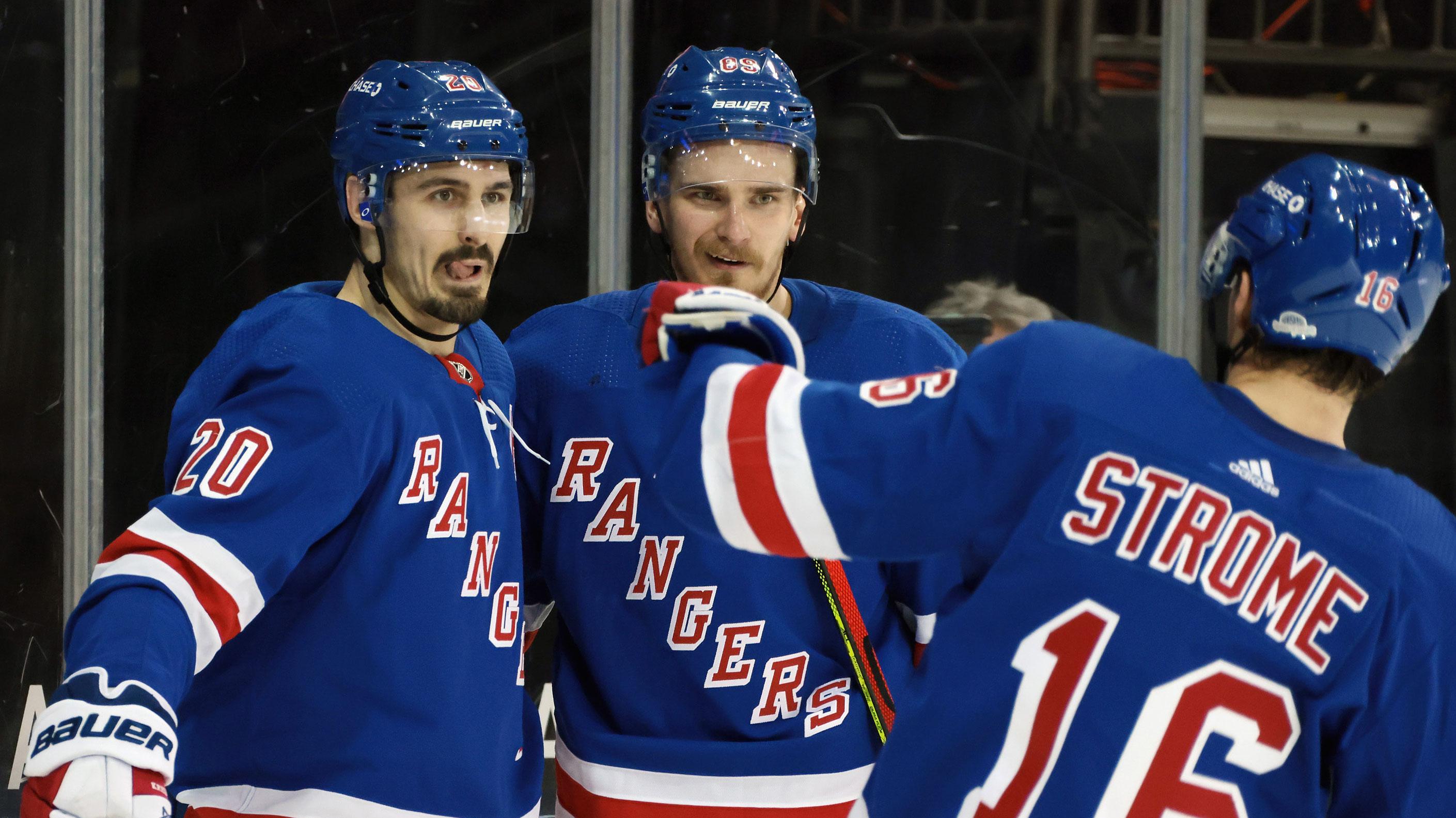 Mar 2, 2021; New York, New York, USA; New York Rangers left wing Chris Kreider (20) celebrates with teammates after scoring a goal against the Buffalo Sabres during the second period at Madison Square Garden. / Bruce Bennett-POOL PHOTOS-USA TODAY Sports