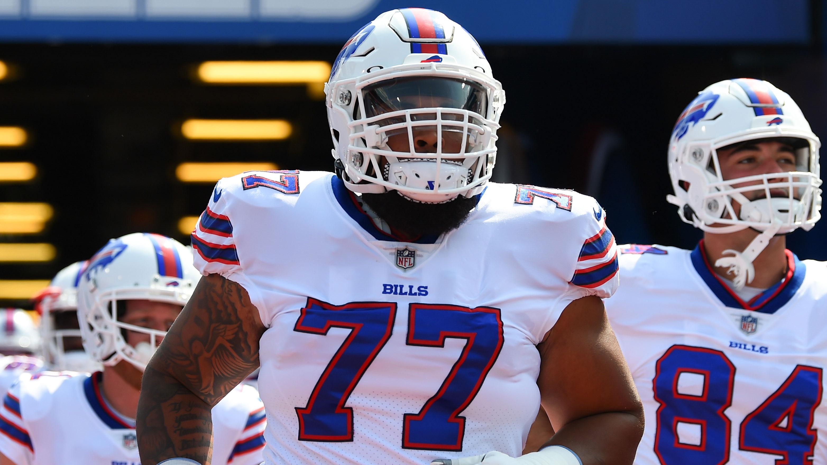 Aug 28, 2021; Orchard Park, New York, USA; Buffalo Bills offensive guard Jamil Douglas (77) jogs to the field prior to the game against the Green Bay Packers at Highmark Stadium. / Rich Barnes-USA TODAY Sports