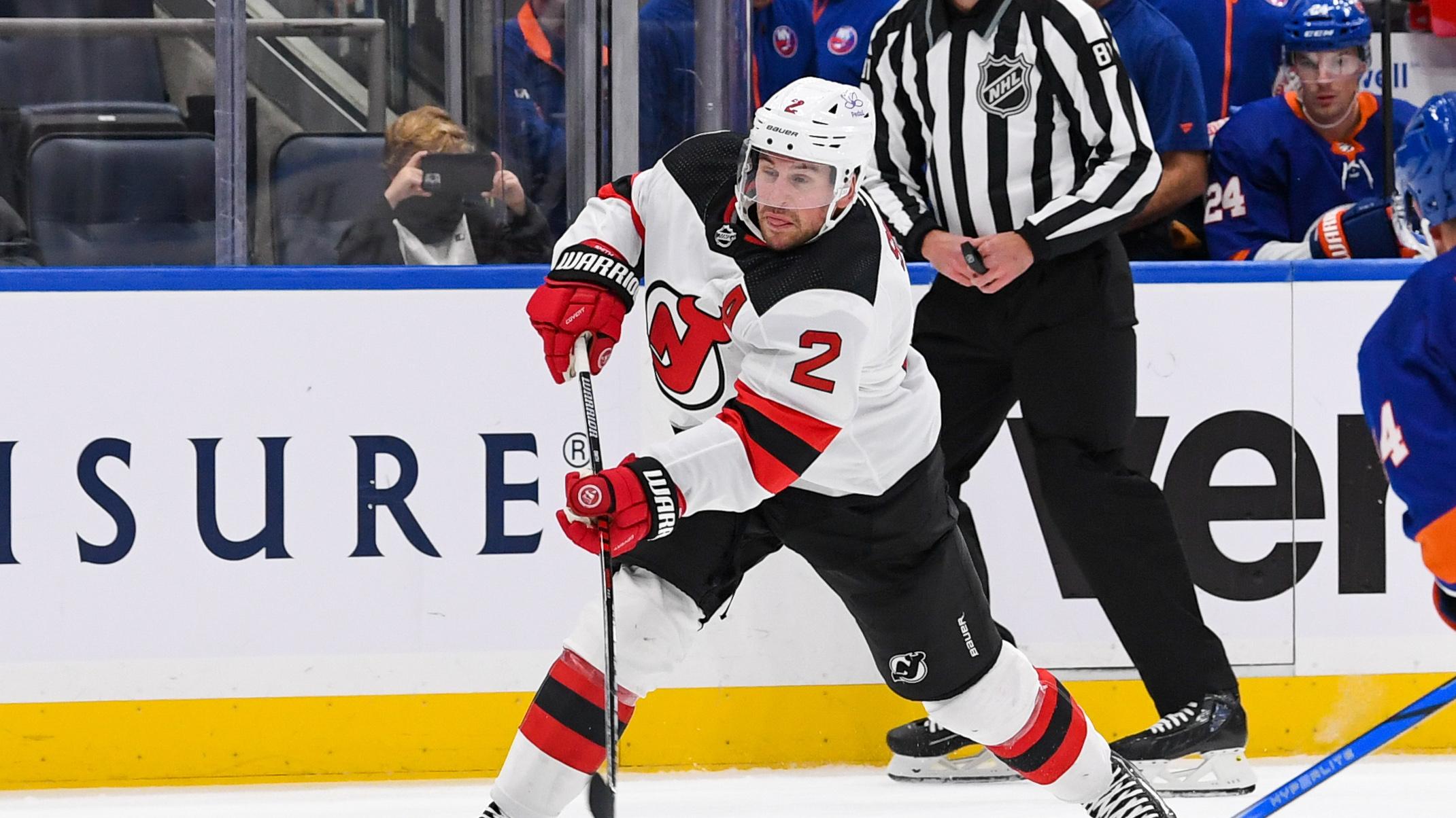 New Jersey Devils Defenseman Brendan Smith (2) attempts a shot against the New York Islanders during the third period at UBS Arena. / Dennis Schneidler-USA TODAY Sports
