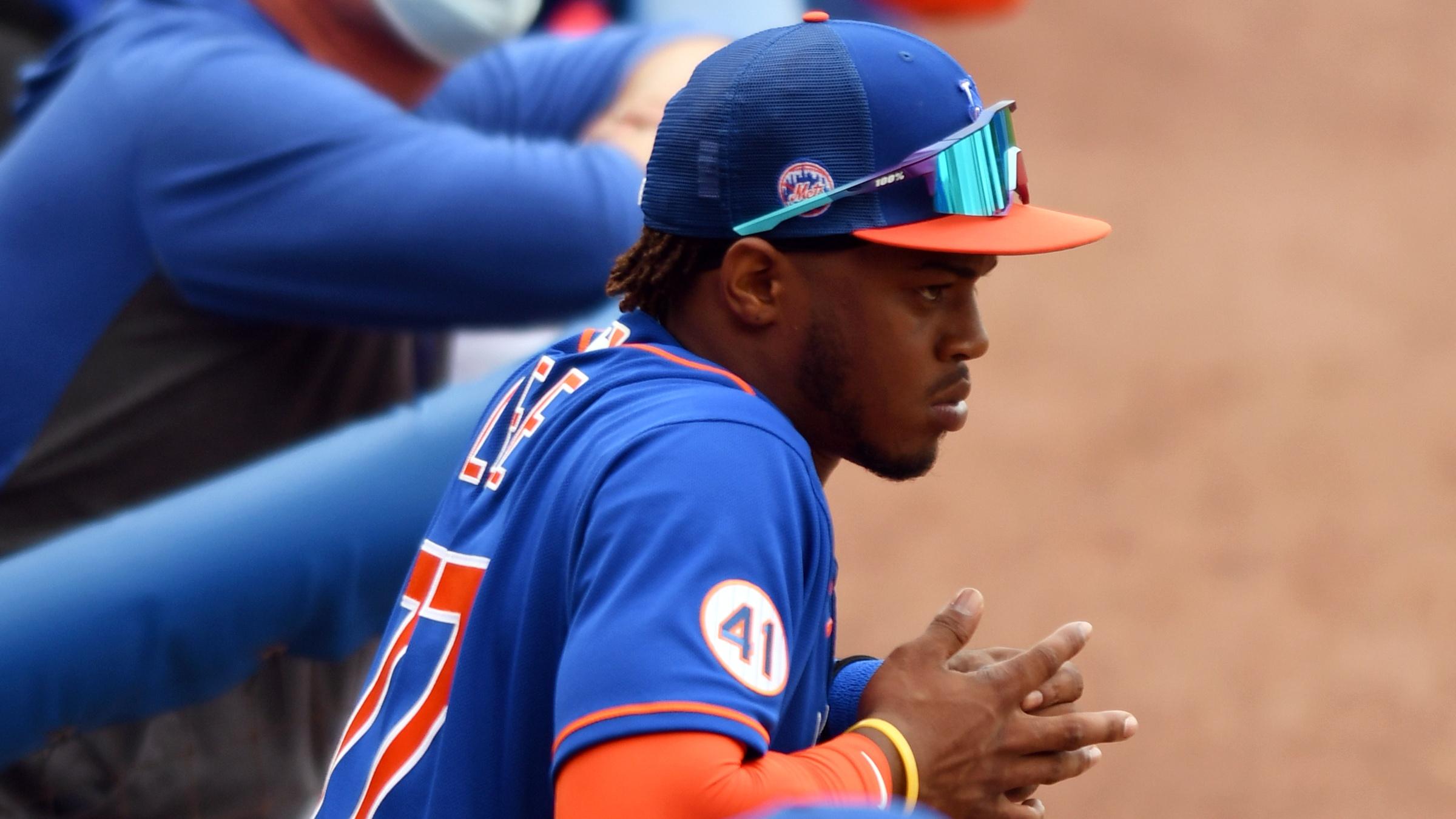 Mar 4, 2021; Port St. Lucie, Florida, USA; New York Mets center fielder Khalil Lee (77) watches game action against the Washington Nationals during a spring training game at Clover Park. / © Jim Rassol-USA TODAY Sports