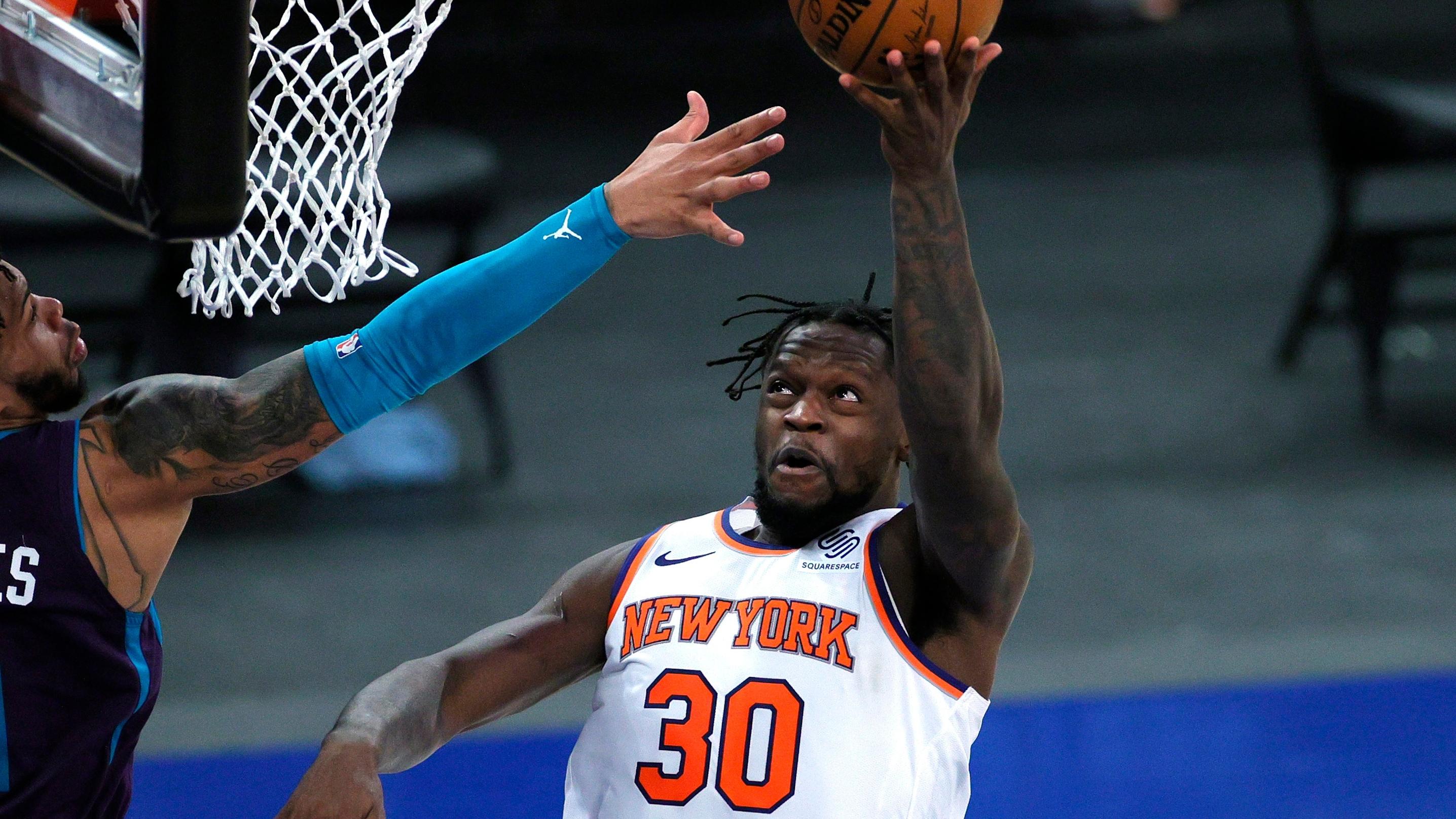 Apr 20, 2021; New York, New York, USA; Julius Randle #30 of the New York Knicks goes to the basket as Miles Bridges #0 of the Charlotte Hornets defends during the second half at Madison Square Garden. / Sarah Stier/POOL PHOTOS-USA TODAY Sports