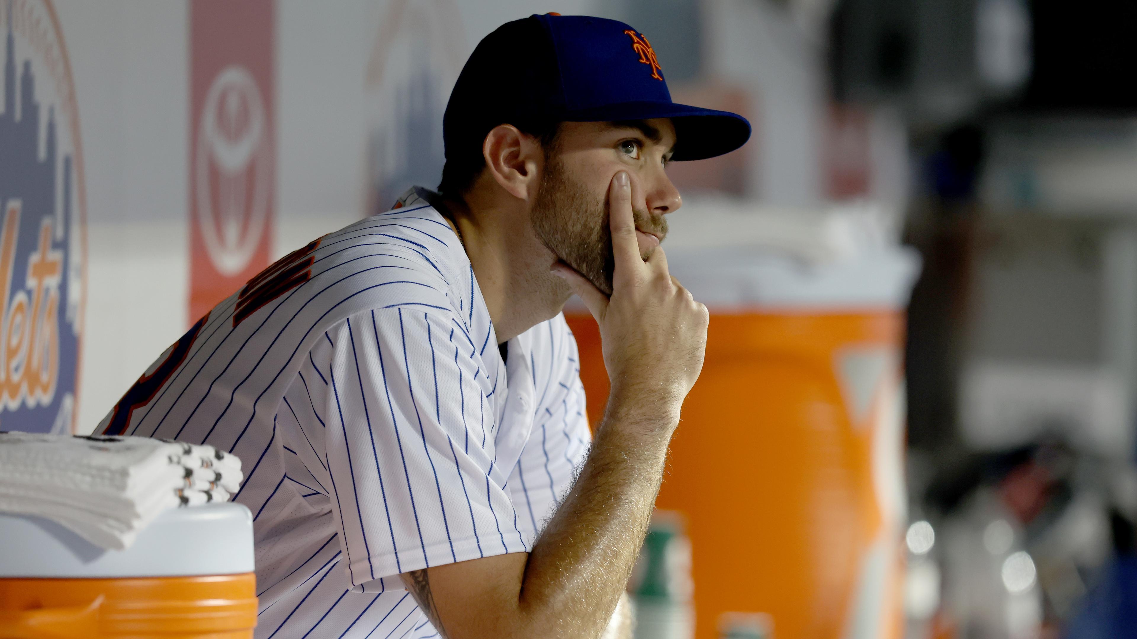 Jun 15, 2022; New York City, New York, USA; New York Mets starting pitcher David Peterson (23) reacts in the dugout after being taken out of the game against the Milwaukee Brewers during the fifth inning at Citi Field. Mandatory Credit: Brad Penner-USA TODAY Sports / Brad Penner-USA TODAY Sports