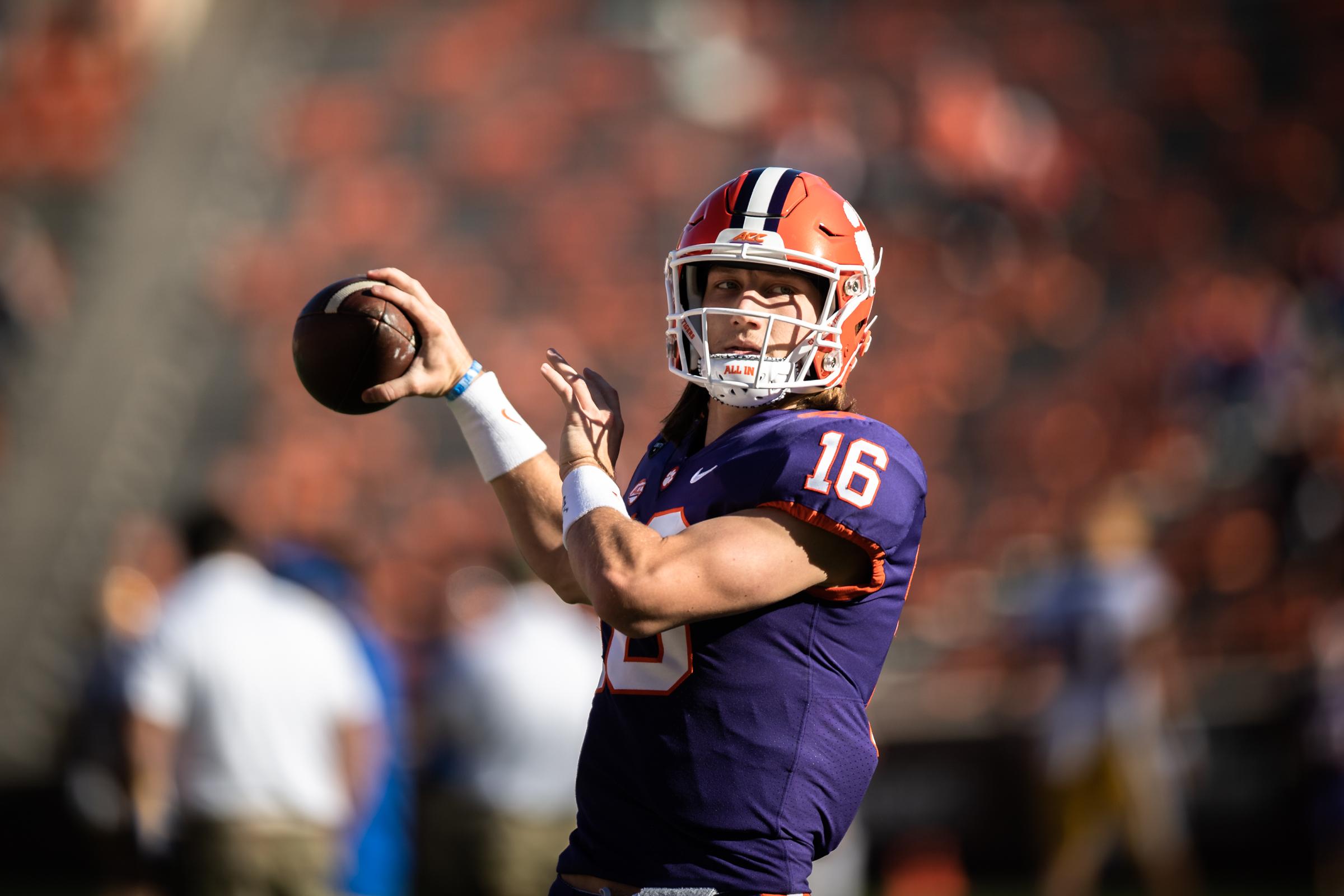 Nov 28, 2020; Clemson, SC, USA; Clemson quarterback Trevor Lawrence (16) warms up with his team before the game against Pittsburgh at Memorial Stadium / Ken Ruinard-USA TODAY Sports