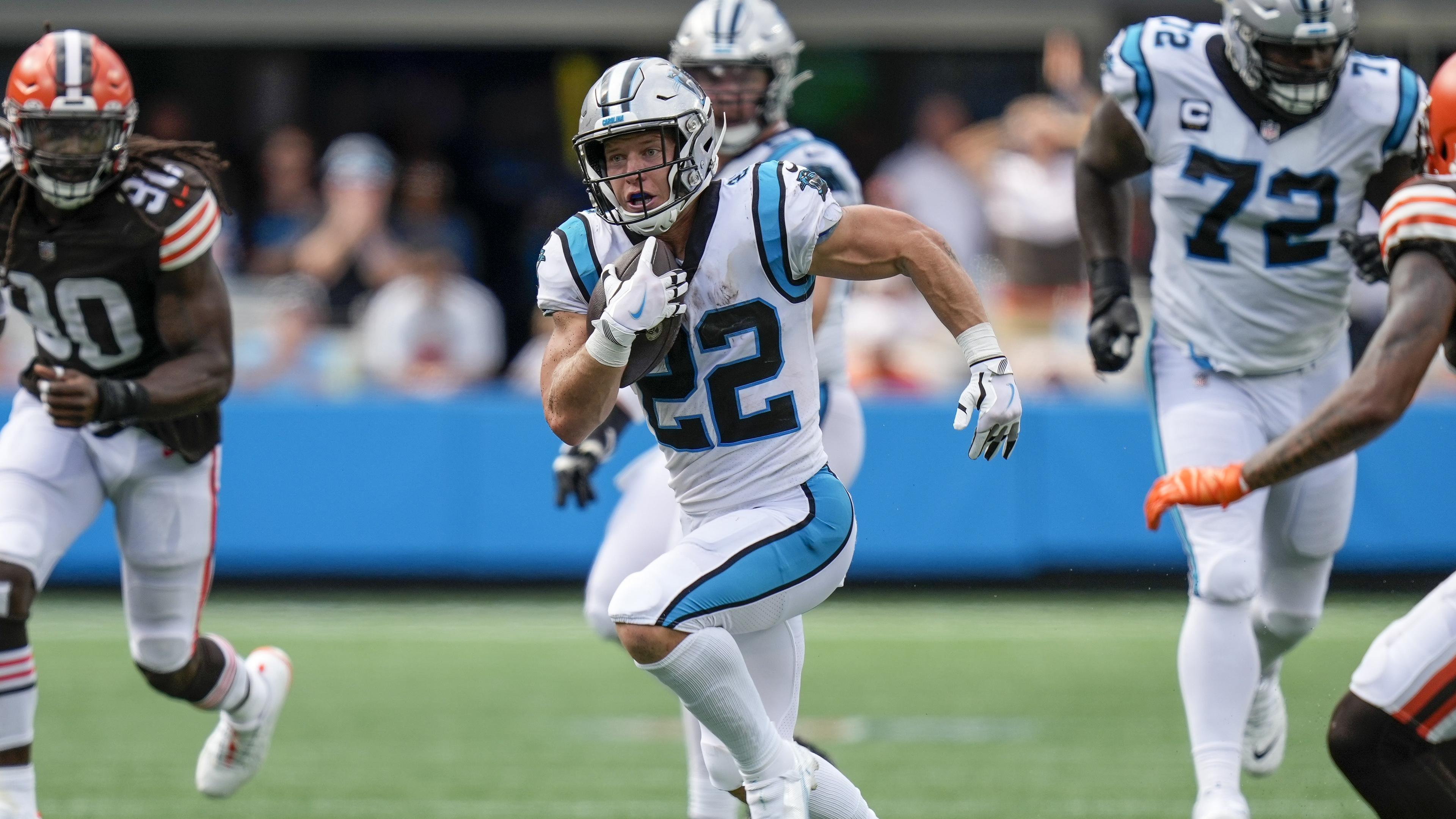 Sep 11, 2022; Charlotte, North Carolina, USA; Carolina Panthers running back Christian McCaffrey (22) breaks into open field during the second half against the Cleveland Browns at Bank of America Stadium. Mandatory Credit: Jim Dedmon-USA TODAY Sports / Sep 11, 2022; Charlotte, North Carolina, USA; Carolina Panthers running back Christian McCaffrey (22) breaks into open field during the second half against the Cleveland Browns at Bank of America Stadium. Mandatory Credit: Jim Dedmon-USA TODAY Sports