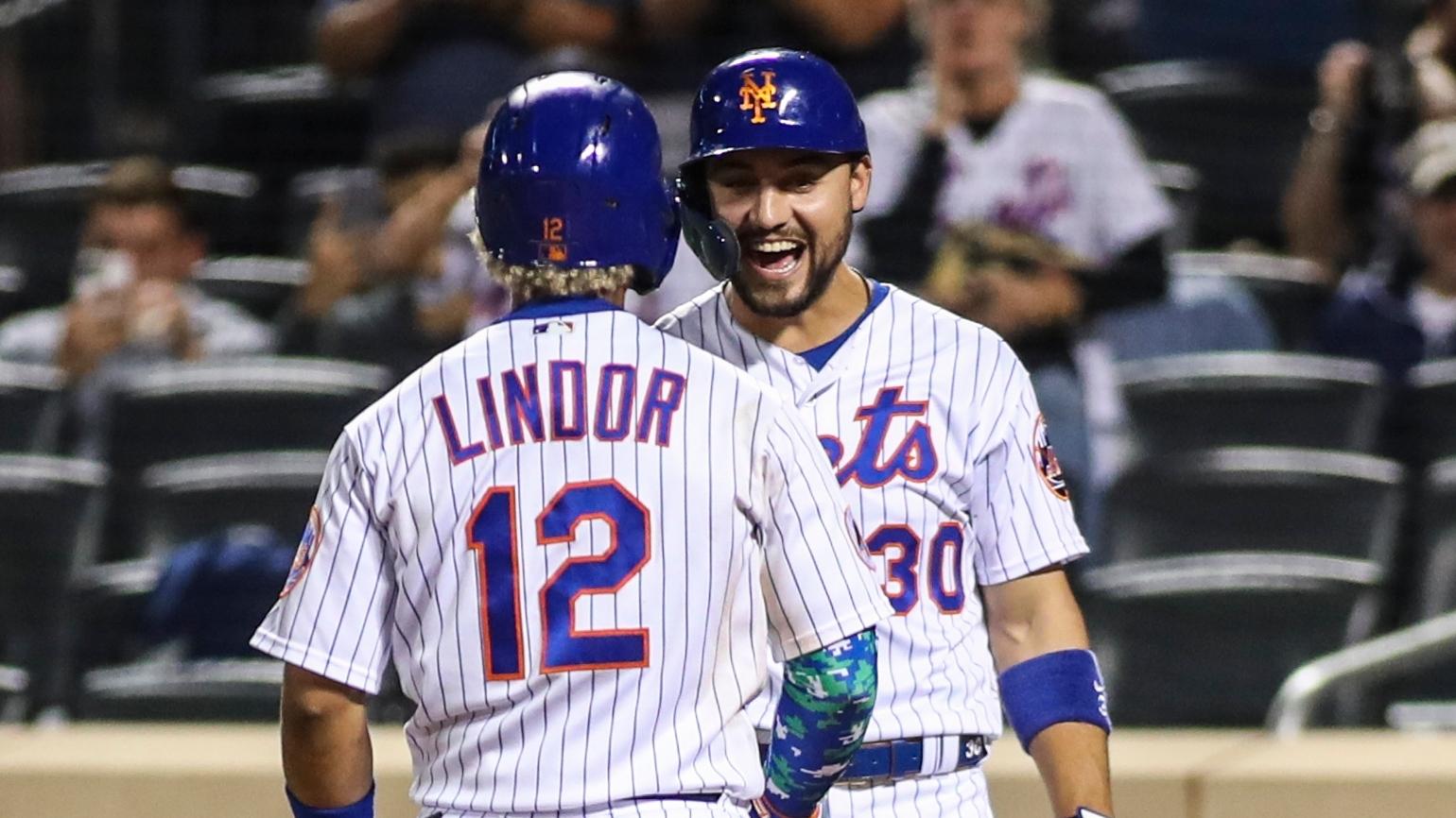 Sep 12, 2021; New York City, New York, USA; New York Mets shortstop Francisco Lindor (12) is greeted by right fielder Michael Conforto (30) after hitting his third home run of the game in the eighth inning against the New York Yankees at Citi Field. / Wendell Cruz-USA TODAY Sports