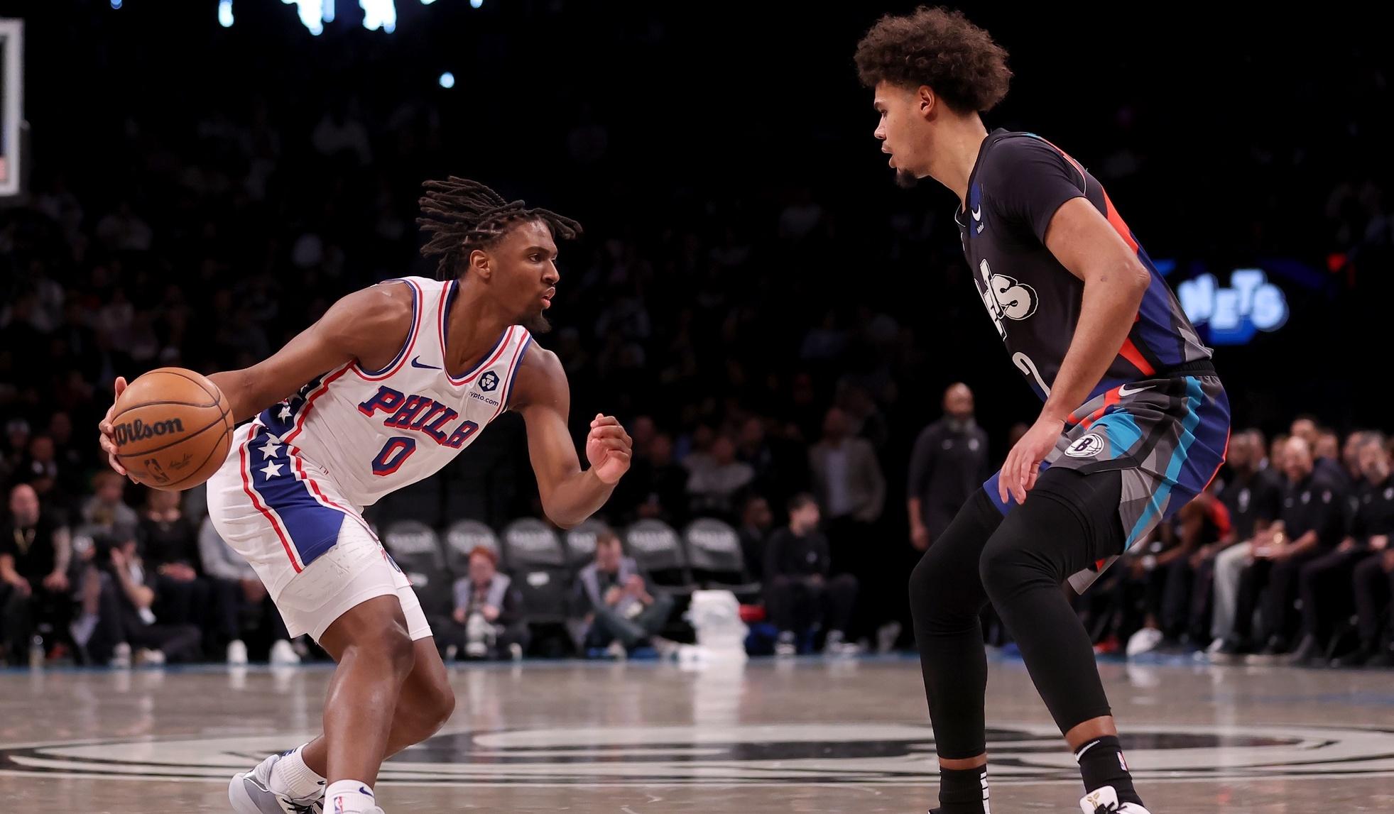 Philadelphia 76ers guard Tyrese Maxey (0) controls the ball against Brooklyn Nets forward Cameron Johnson (2) during the second quarter at Barclays Center. / Brad Penner-USA TODAY Sports