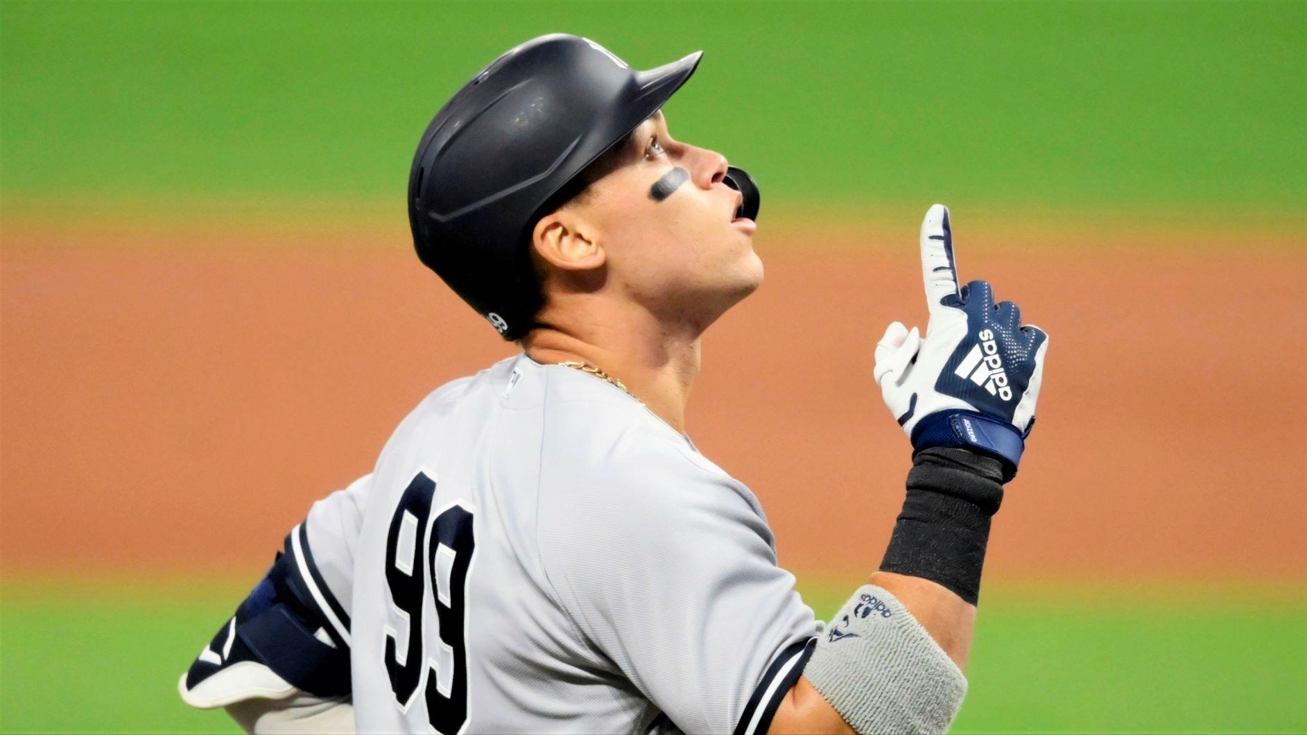 Sep 29, 2020; Cleveland, Ohio, USA; New York Yankees right fielder Aaron Judge (99) celebrates after hitting a two-run home run against the Cleveland Indians in the first inning at Progressive Field. Mandatory Credit: David Richard-USA TODAY Sports / © David Richard-USA TODAY Sports