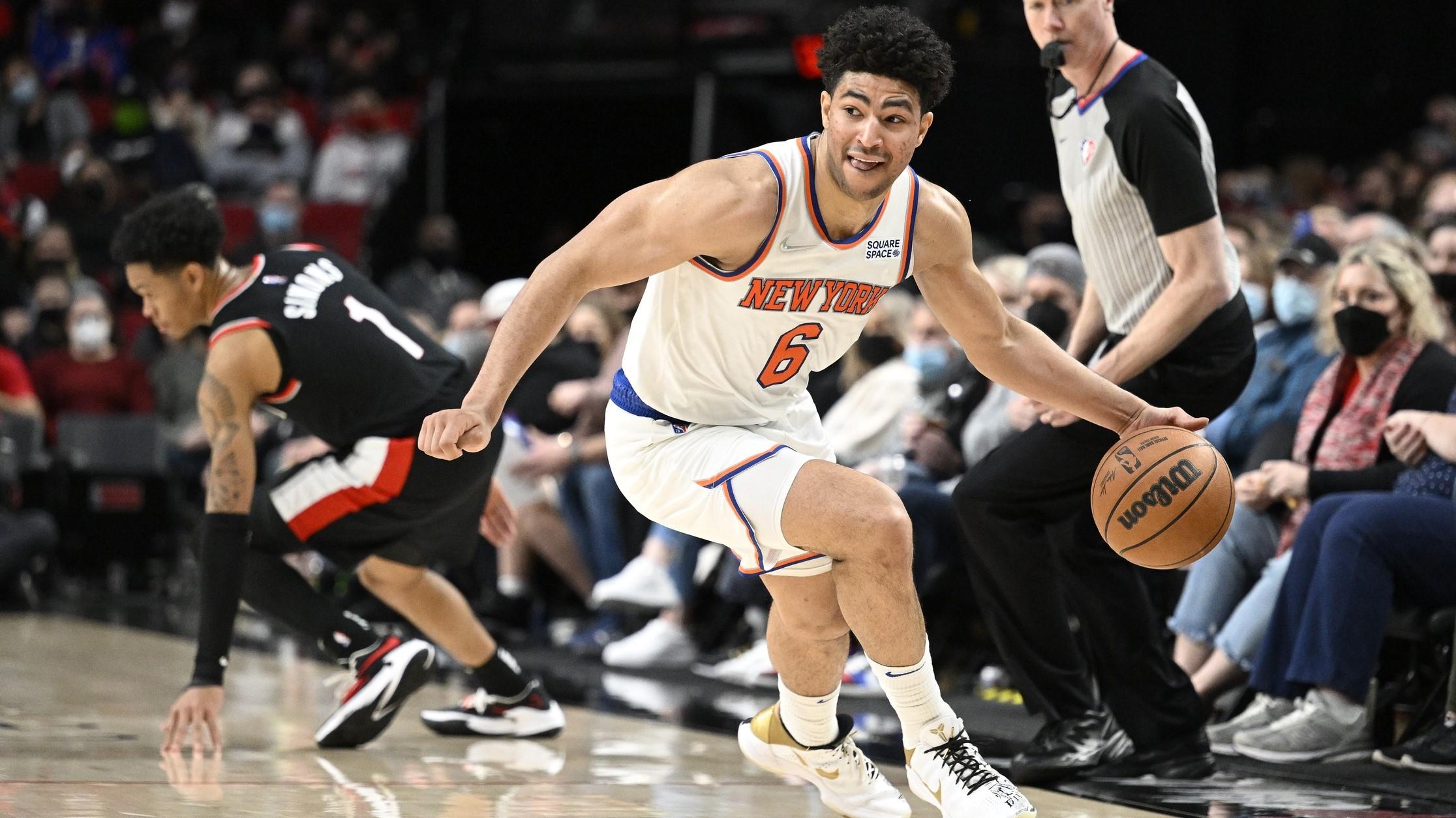 Feb 12, 2022; Portland, Oregon, USA; New York Knicks guard Quentin Grimes (6) steals the basket ball during the the second half against Portland Trail Blazers guard Anfernee Simons (1) at Moda Center. / Troy Wayrynen-USA TODAY Sports