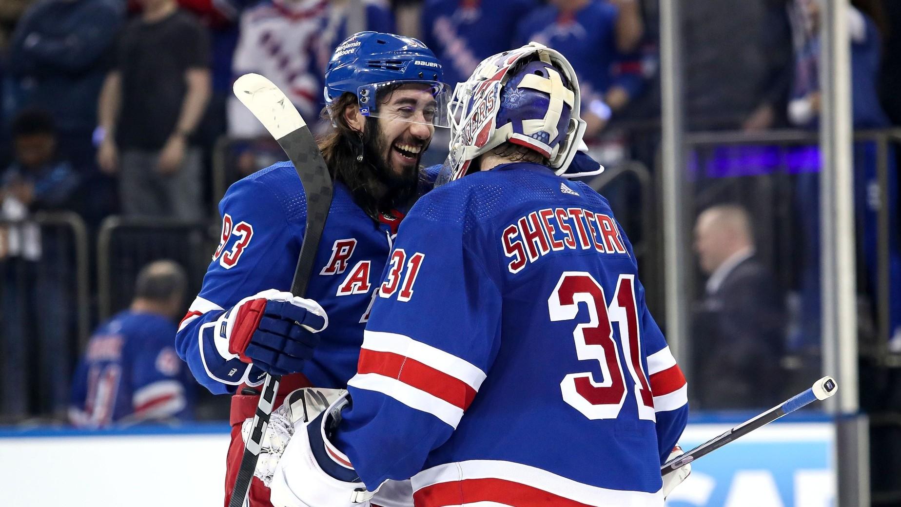 New York Rangers center Mika Zibanejad (93) and goalie Igor Shesterkin (31) celebrate after a 5-2 win against the New Jersey Devils in game six of the first round of the 2023 Stanley Cup Playoffs. / Danny Wild-USA TODAY Sports
