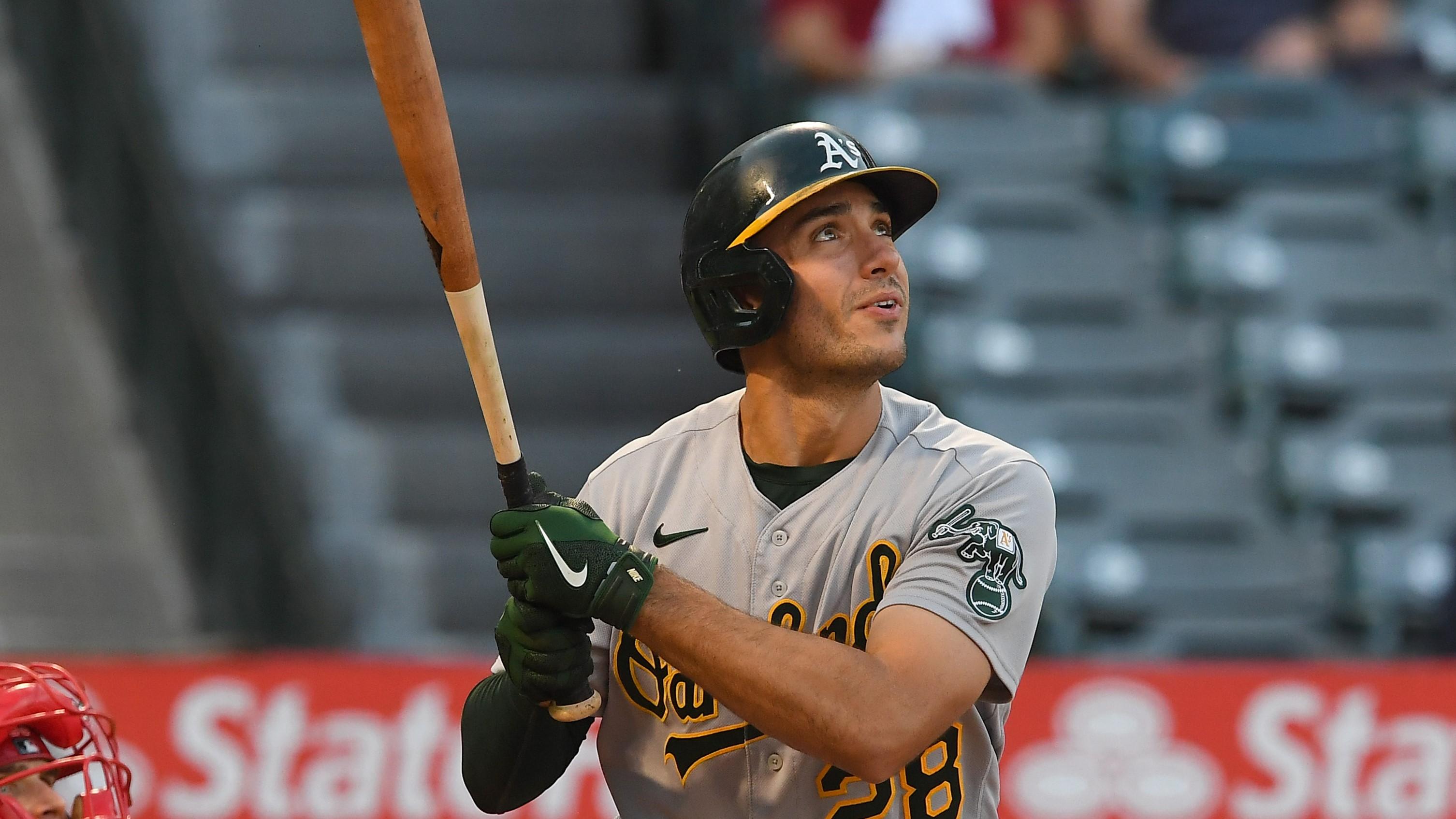 Oakland Athletics first baseman Matt Olson (28) hits a solo home run against the Los Angeles Angels in the first inning at Angel Stadium. / Jayne Kamin-Oncea-USA TODAY Sports
