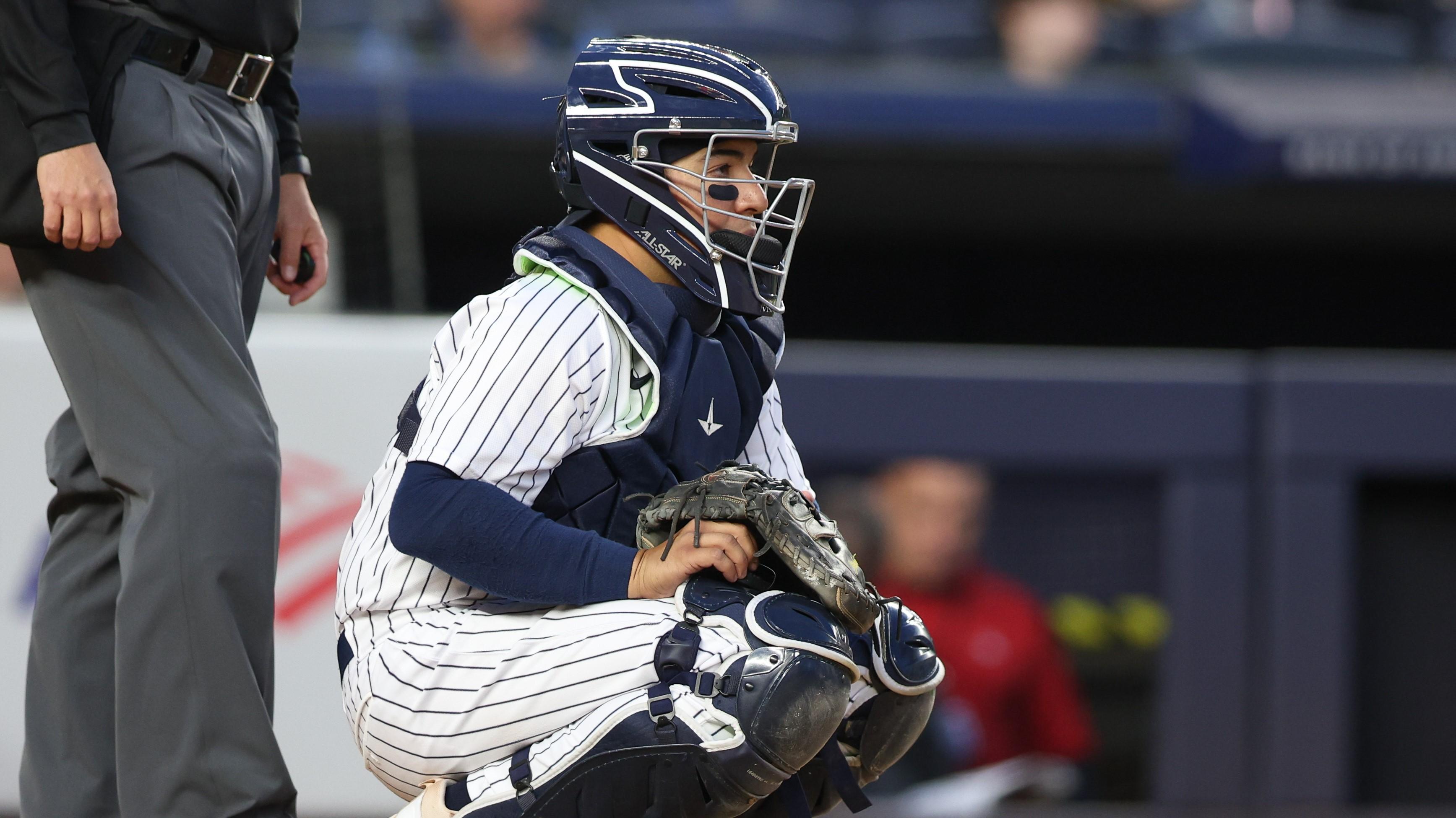 Apr 22, 2022; Bronx, New York, USA; New York Yankees catcher Jose Trevino (39) uses an electronic device to signal a pitch during the second inning against the Cleveland Guardians at Yankee Stadium. Mandatory Credit: Vincent Carchietta-USA TODAY Sports / Vincent Carchietta-USA TODAY Sports
