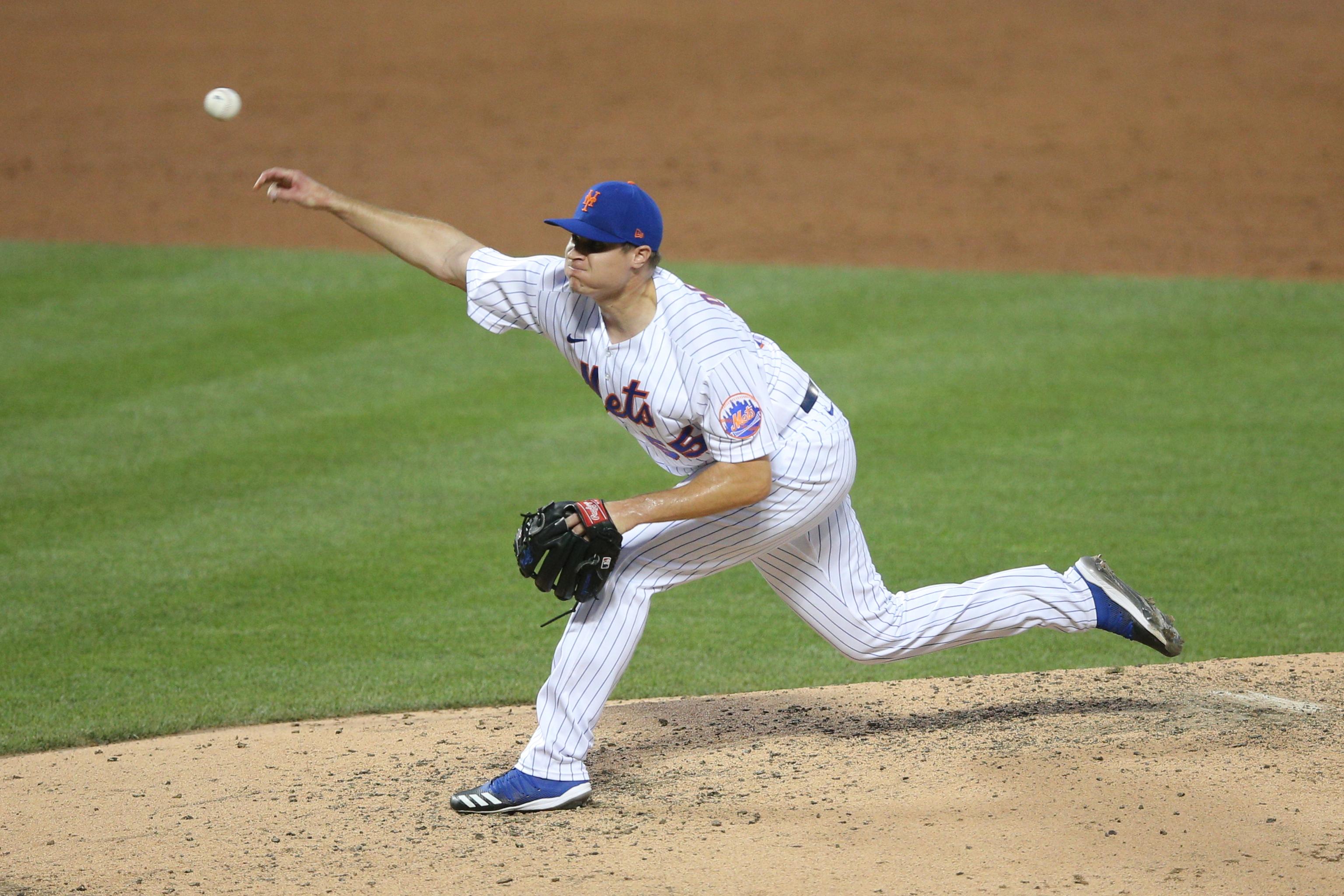 Jul 26, 2020; New York City, New York, USA; New York Mets starting pitcher Corey Oswalt (55) pitches against the Atlanta Braves during the third inning at Citi Field. Mandatory Credit: Brad Penner-USA TODAY Sports / Brad Penner-USA TODAY Sports