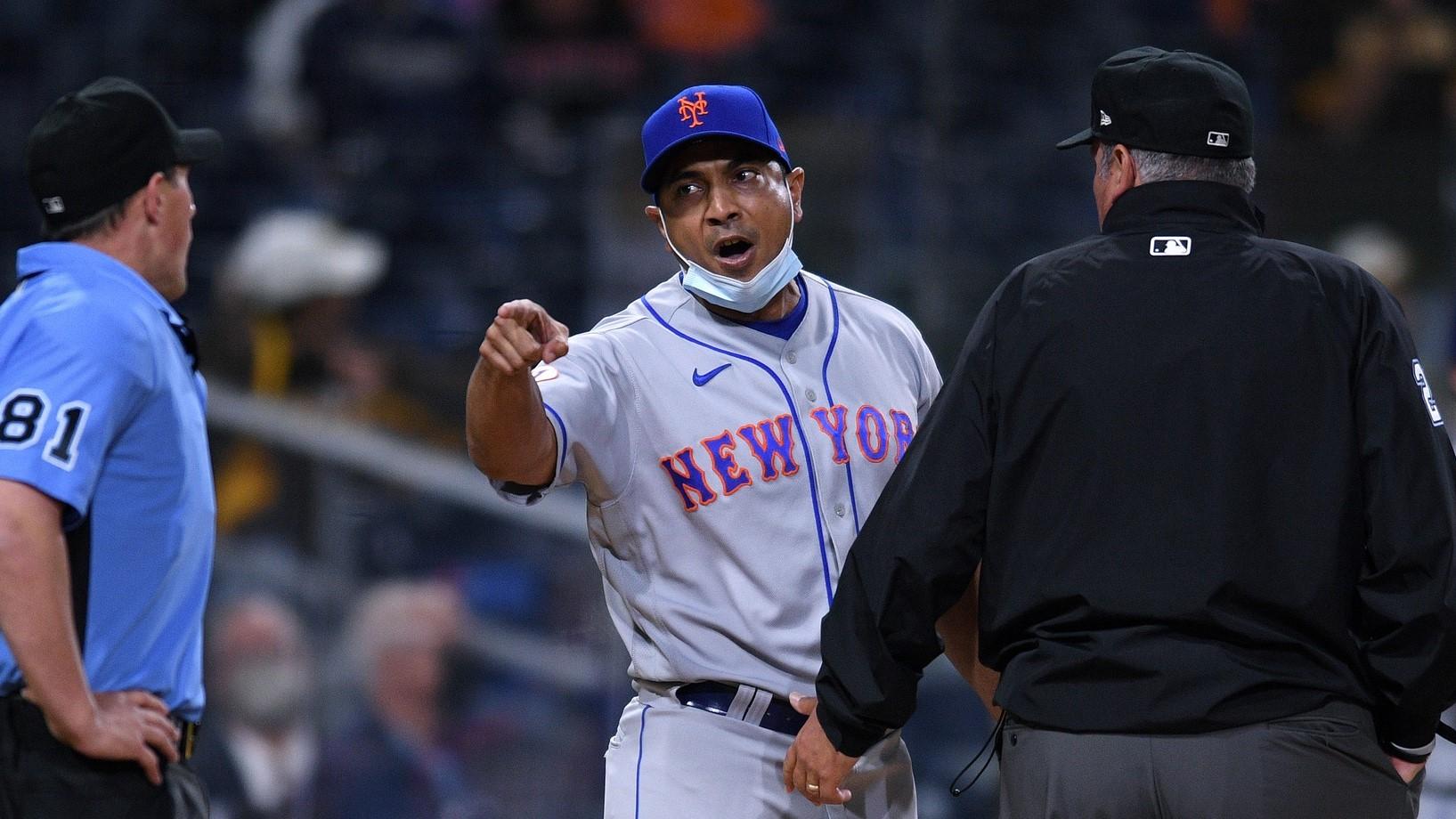 Caption: Jun 4, 2021; San Diego, California, USA; New York Mets manager Luis Rojas (center) reacts after being ejected by home plate umpire Quinn Wolcott (81) during the ninth inning against the San Diego Padres at Petco Park. / Orlando Ramirez-USA TODAY Sports