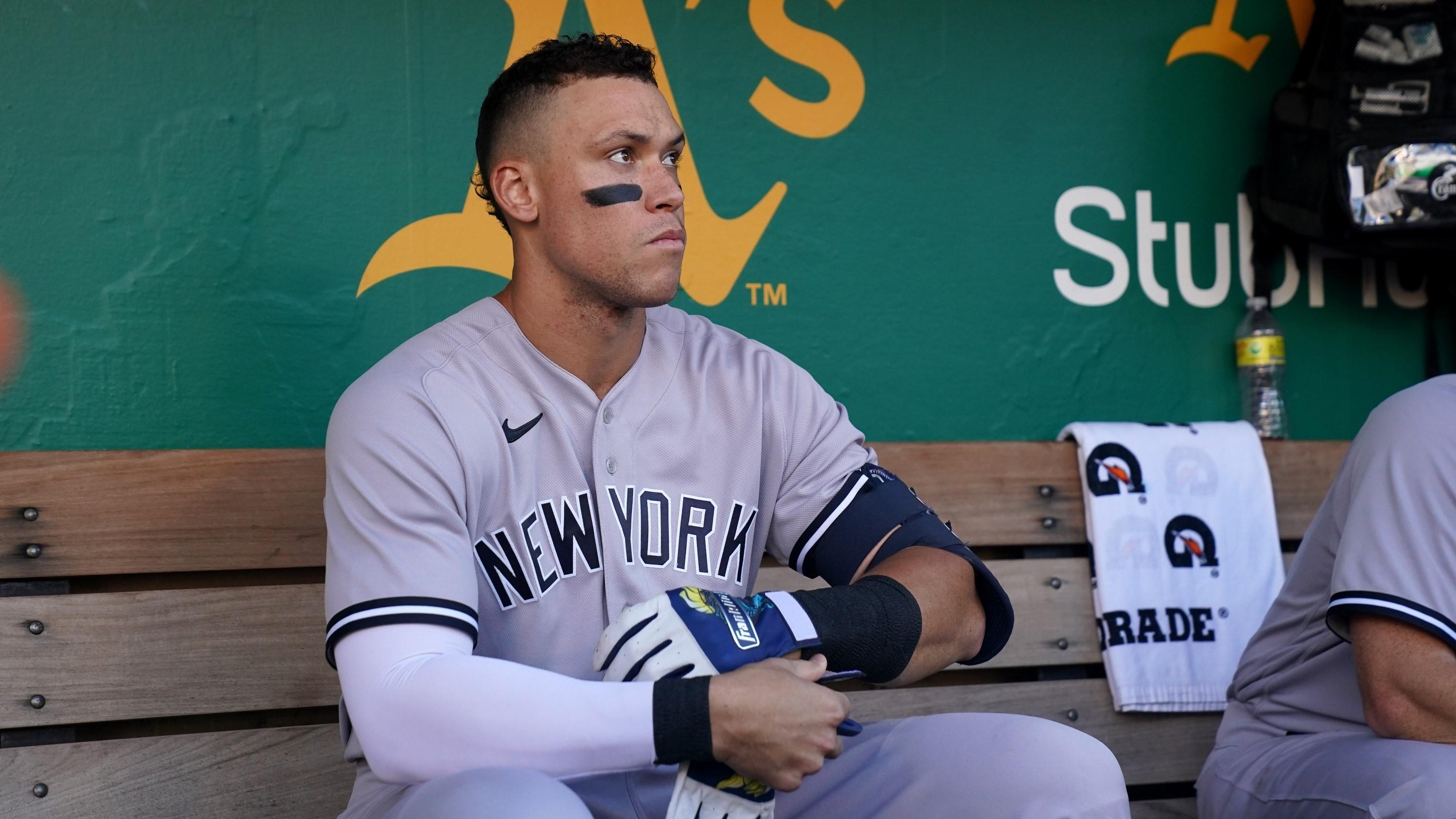Aug 27, 2022; Oakland, California, USA; New York Yankees centerfielder Aaron Judge (99) sits in the dugout before the start of the game against the Oakland Athletics at RingCentral Coliseum. / Cary Edmondson-USA TODAY Sports