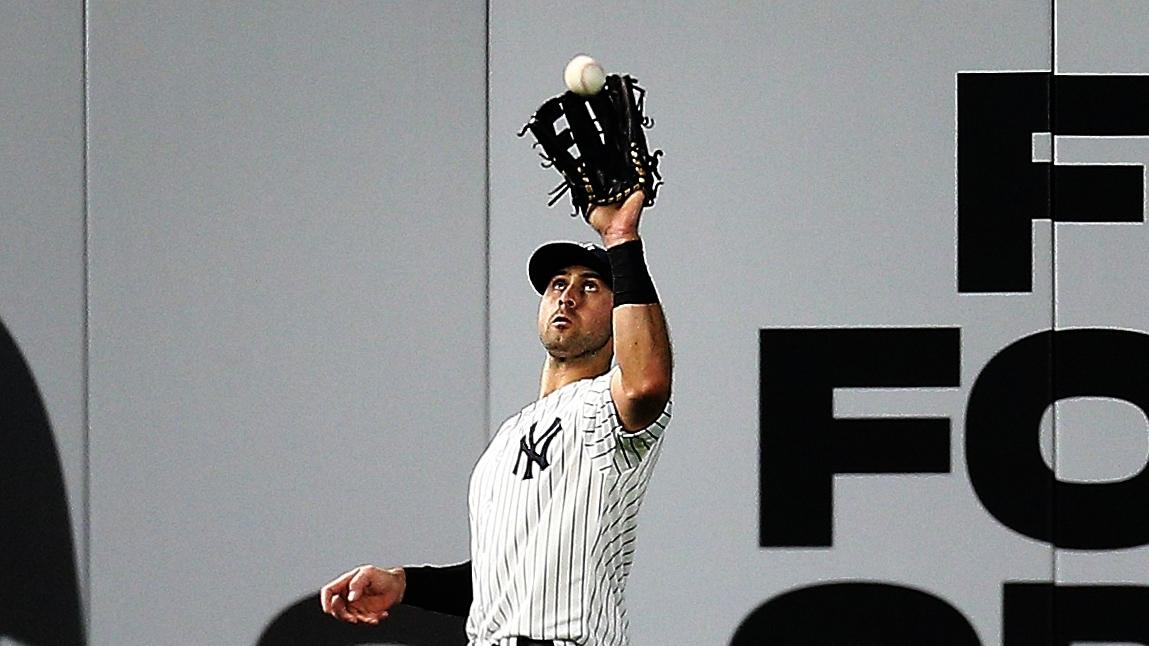 New York Yankees left fielder Joey Gallo (13) catches a fly ball against the Seattle Mariners during the fifth inning at Yankee Stadium. / Andy Marlin-USA TODAY Sports
