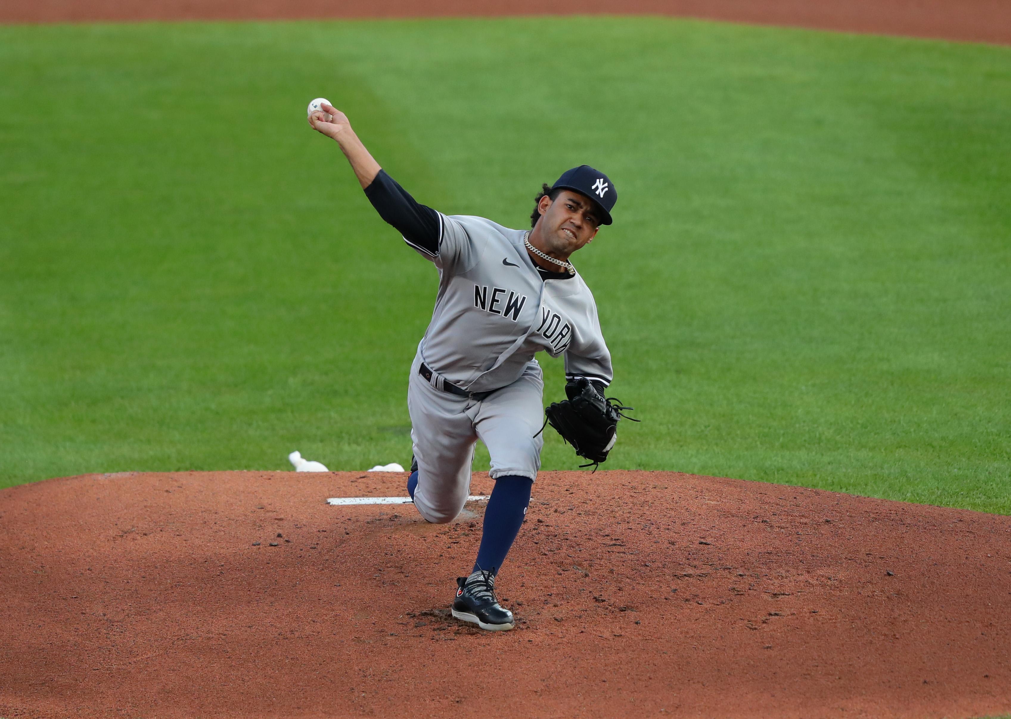 Sep 9, 2020; Buffalo, New York, USA; New York Yankees starting pitcher Deivi Garcia (83) throws a pitch during the first inning against the Toronto Blue Jays at Sahlen Field. Mandatory Credit: Timothy T. Ludwig-USA TODAY Sports / Timothy T. Ludwig-USA TODAY Sports