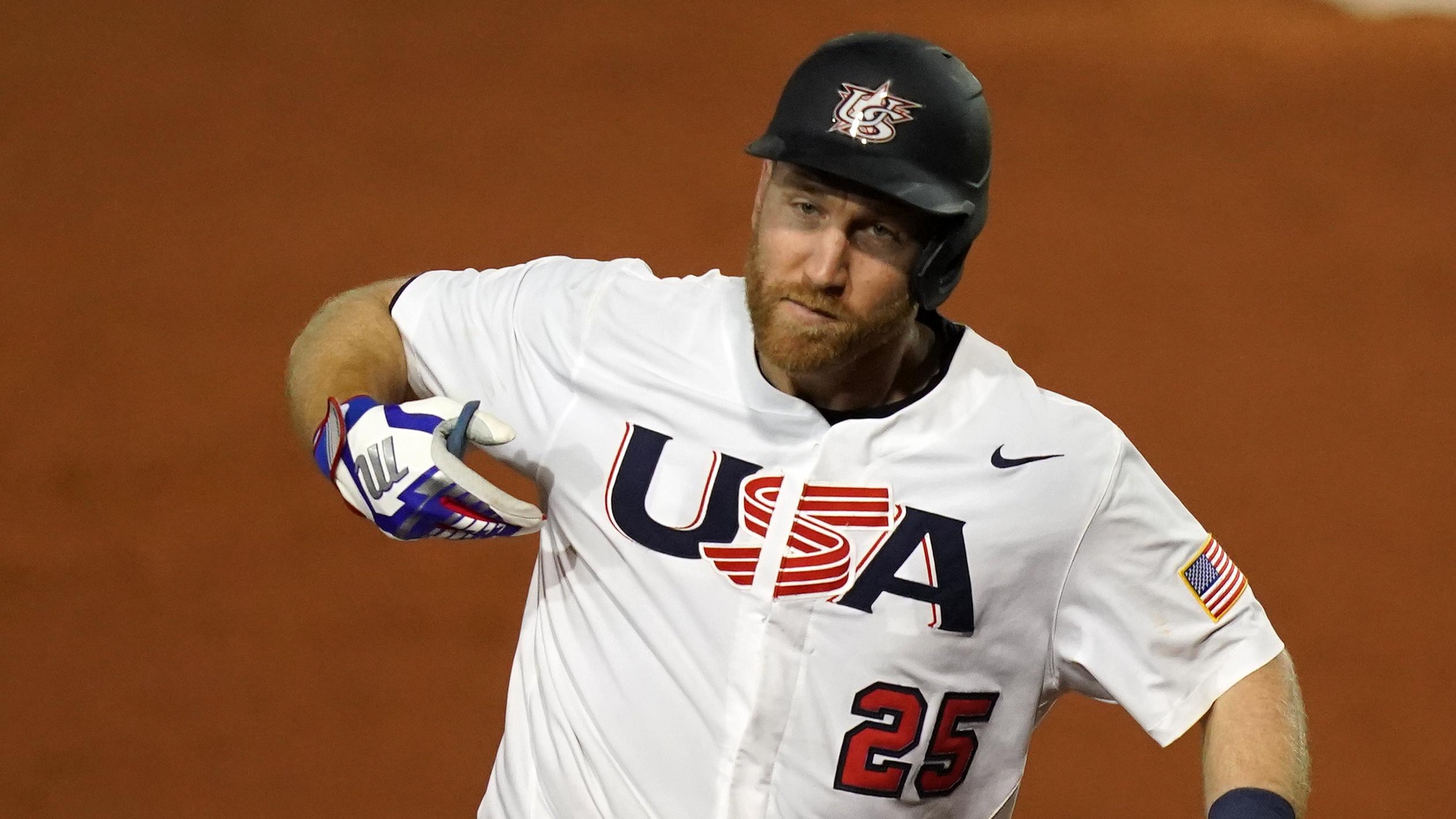 Jun 5, 2021; Port St. Lucie, Florida, USA; USA third baseman Todd Frazier (25) points to his chest while he rounds the bases after hitting a solo homerun in the 7th inning against Venezuela in the Super Round of the WBSC Baseball Americas Qualifier series at Clover Park. / © Jasen Vinlove-USA TODAY Sports