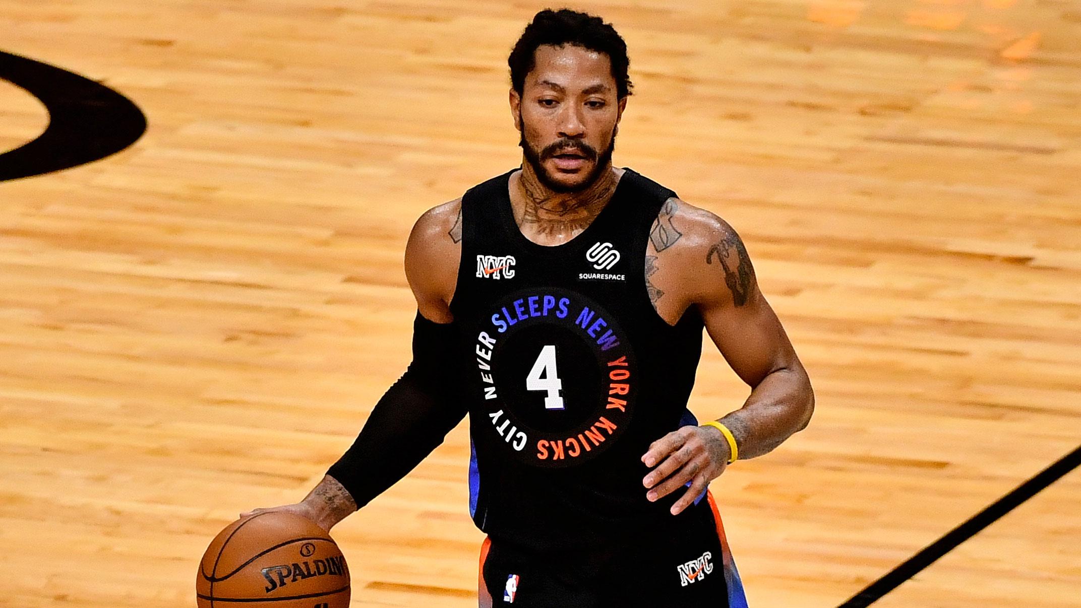 Feb 9, 2021; Miami, Florida, USA; New York Knicks guard Derrick Rose (4) dribbles the ball against the Miami Heat during the first half at American Airlines Arena. / Jasen Vinlove-USA TODAY Sports