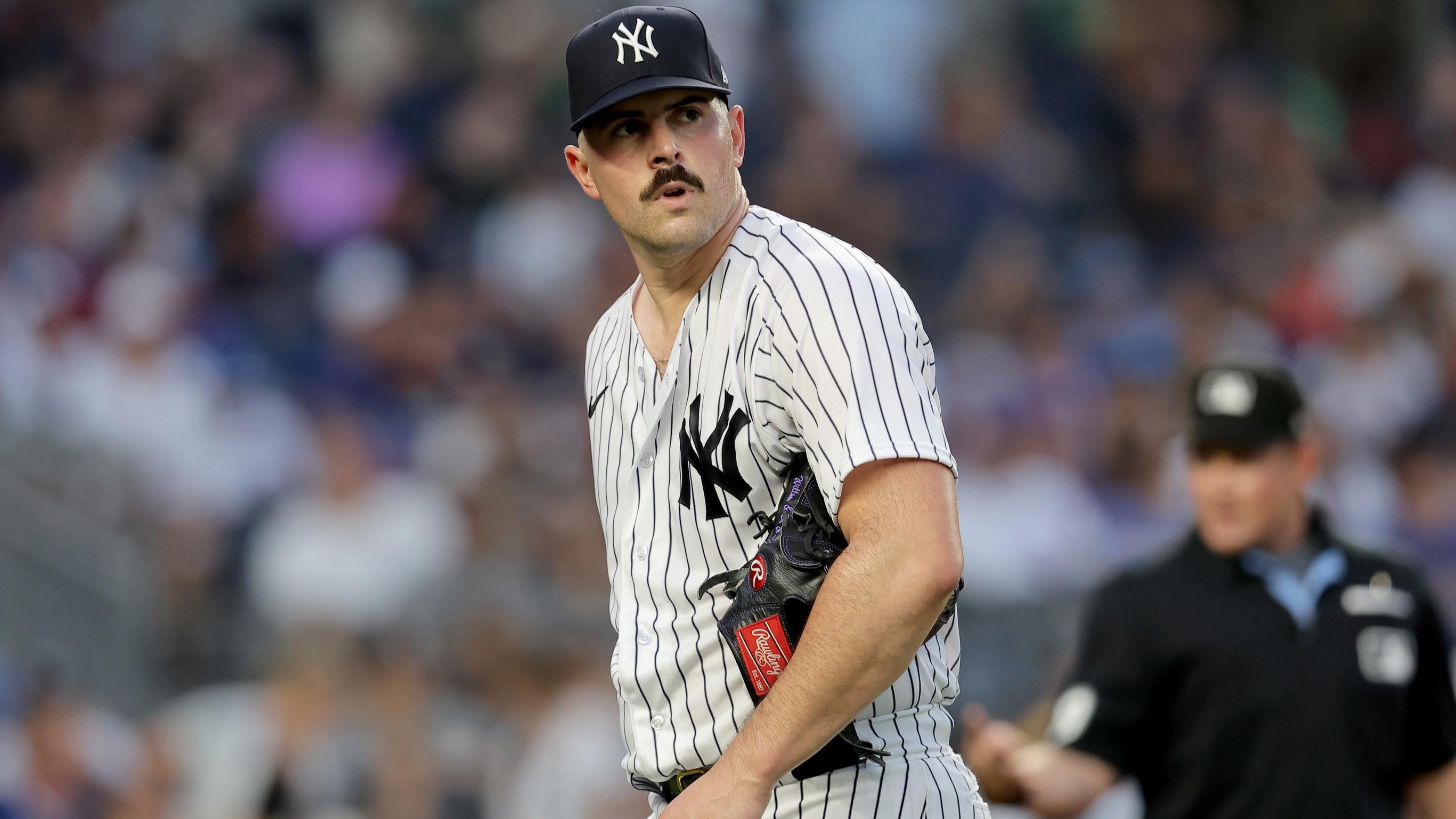 Jul 7, 2023; Bronx, New York, USA; New York Yankees starting pitcher Carlos Rodon (55) reacts during the fifth inning against the Chicago Cubs at Yankee Stadium. / Brad Penner-USA TODAY Sports