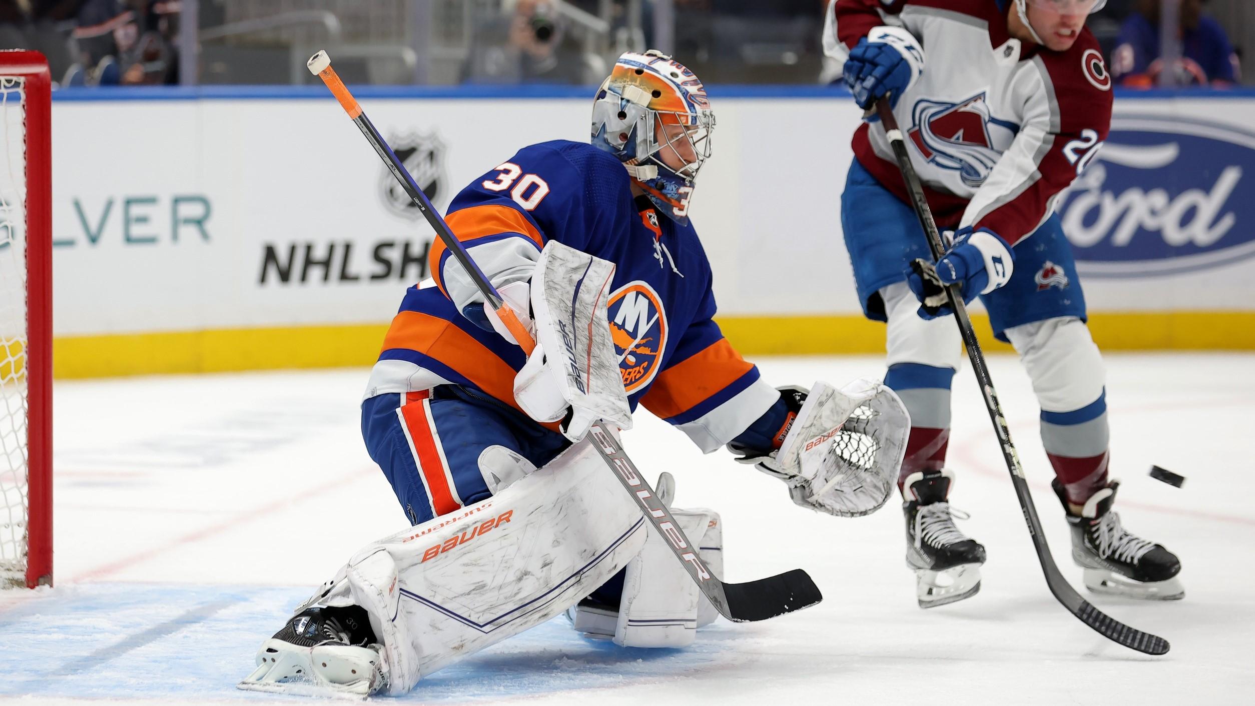 Oct 24, 2023; Elmont, New York, USA; New York Islanders goalie Ilya Sorokin (30) makes a save in front of Colorado Avalanche center Ross Colton (20) during the first period at UBS Arena. / Brad Penner-USA TODAY Sports