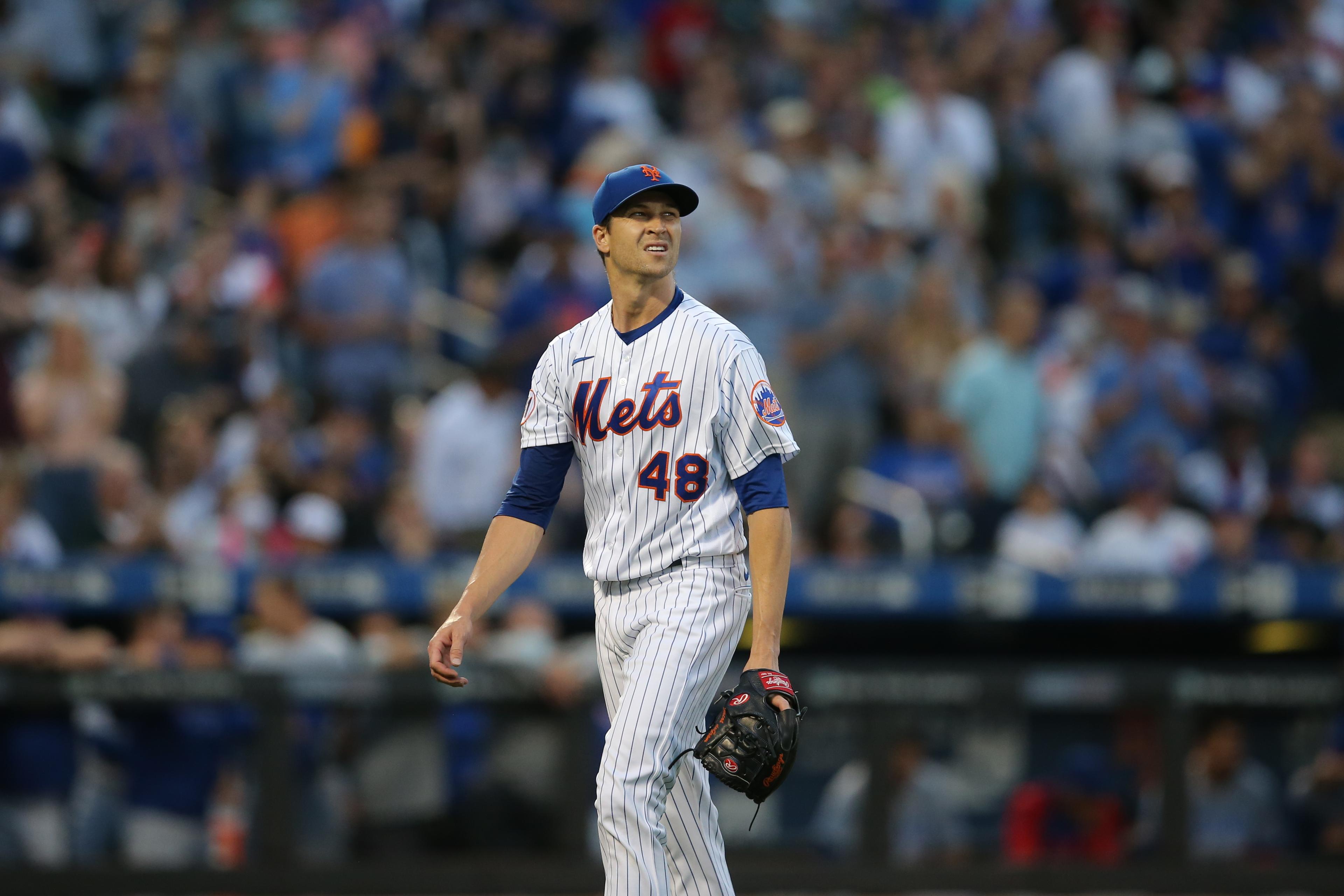 Jun 16, 2021; New York City, New York, USA; New York Mets starting pitcher Jacob deGrom (48) reacts as he walks off the field after the top of the third inning against the Chicago Cubs at Citi Field. He would then leave the game with an injury. / Brad Penner-USA TODAY Sports