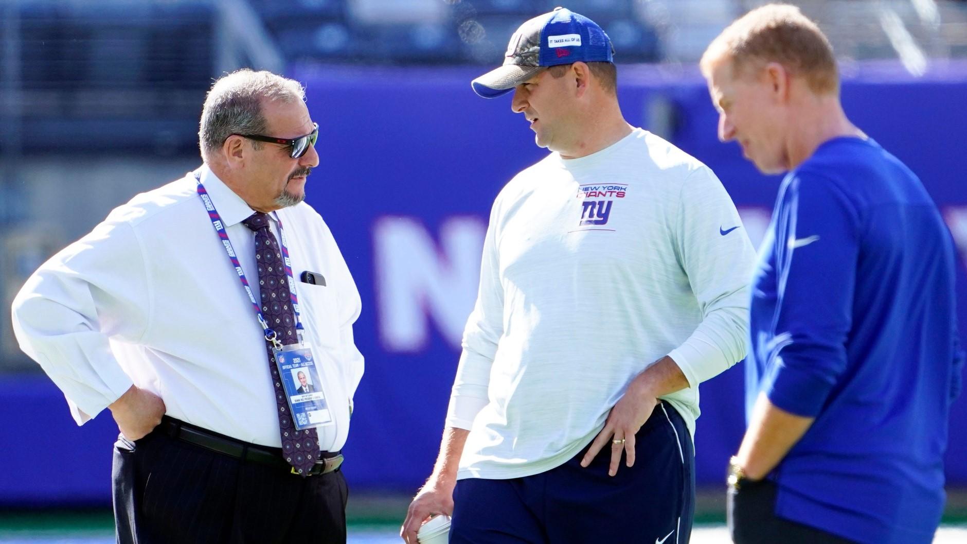 (from left) New York Giants general manager Dave Gettleman, head coach Joe Judge, and offensive coordinator Jason Garrett on the field before the game at MetLife Stadium on Sunday, Sept. 26, 2021, in East Rutherford. / Danielle Parhizkaran/NorthJersey.com