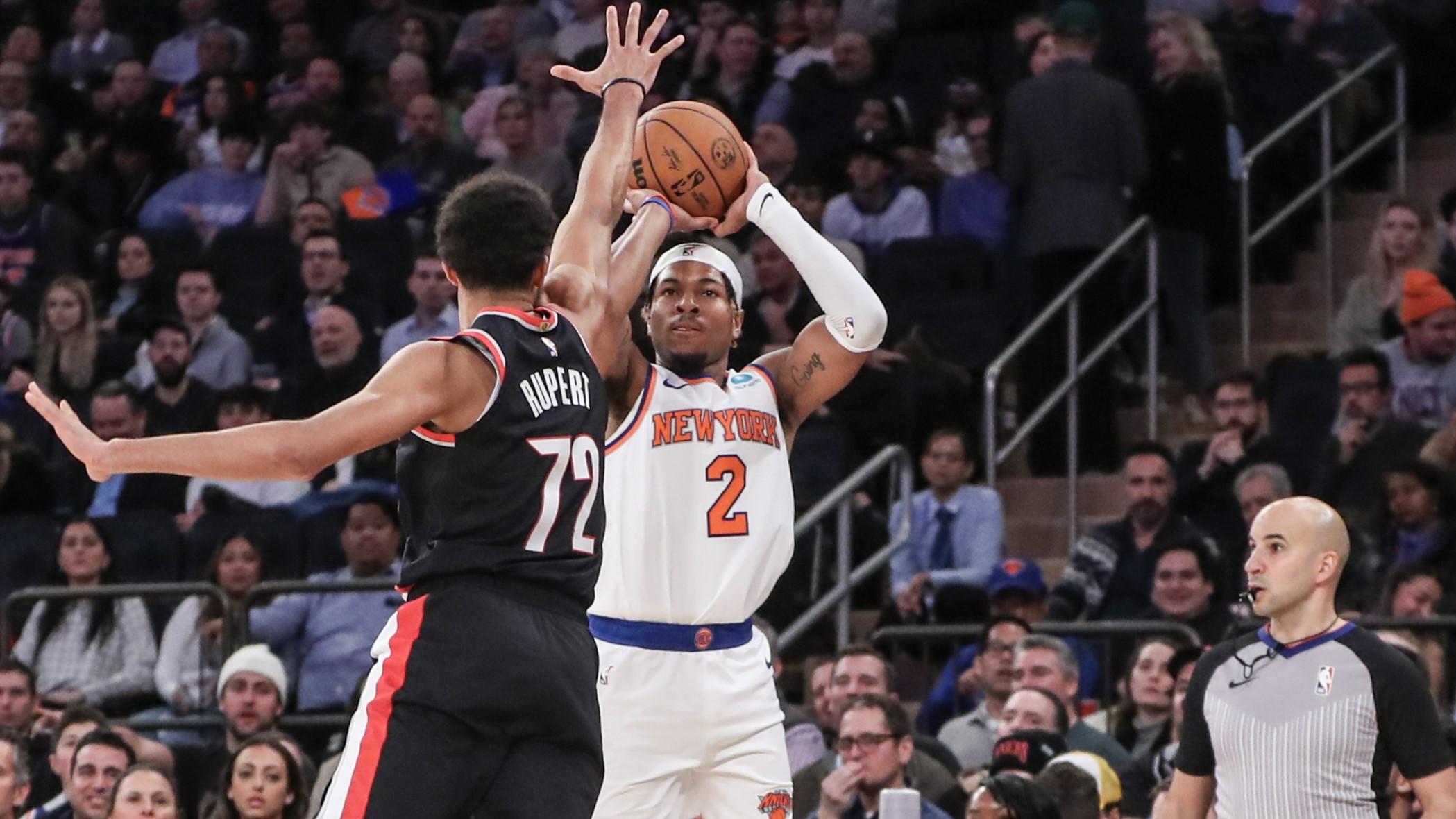 Jan 9, 2024; New York, New York, USA; New York Knicks guard Miles McBride (2) takes a three point shot past Portland Trail Blazers guard Rayan Rupert (72) in the fourth quarter at Madison Square Garden. Mandatory Credit: Wendell Cruz-USA TODAY Sports / © Wendell Cruz-USA TODAY Sports