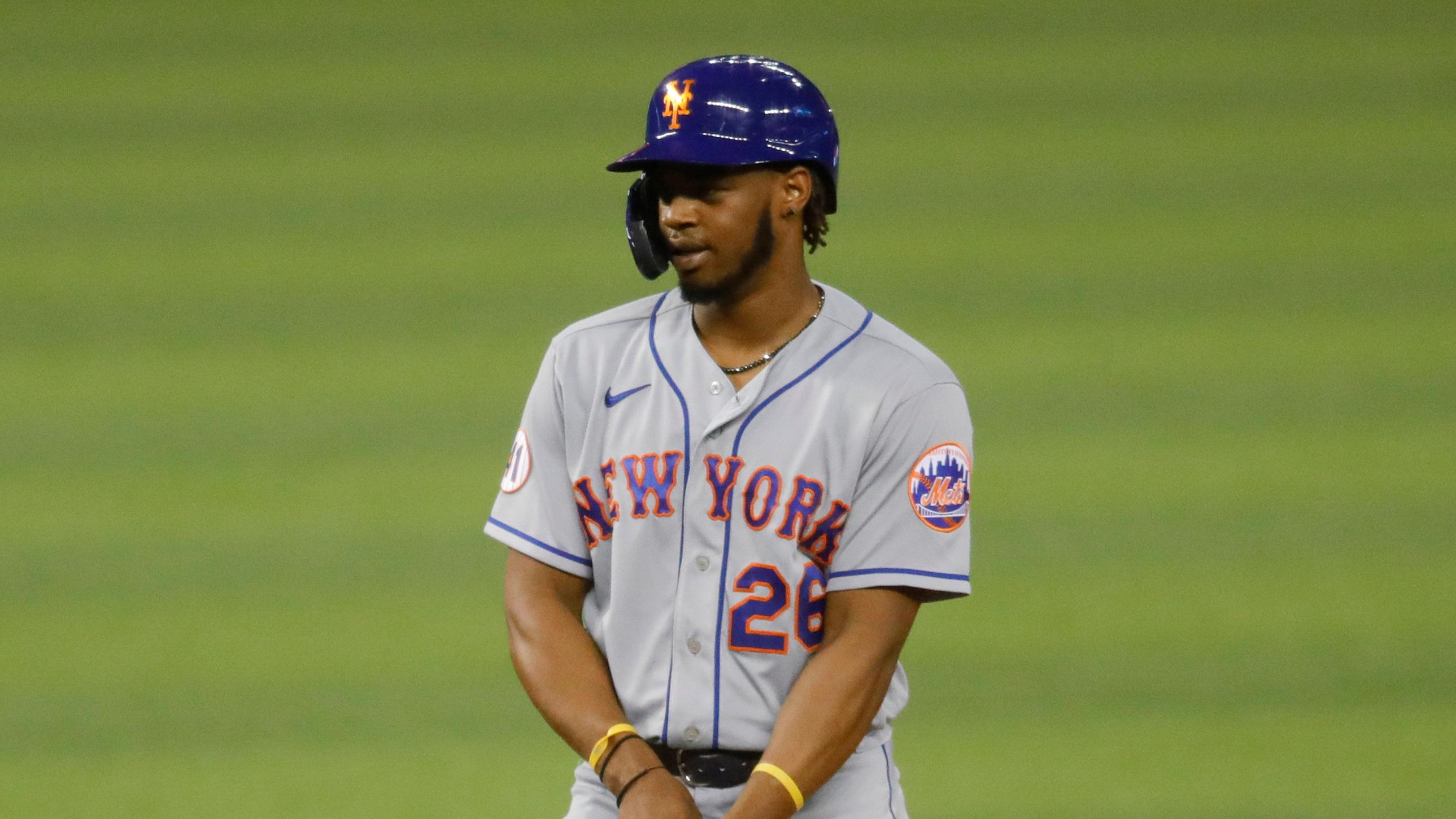 May 21, 2021; Miami, Florida, USA; New York Mets center fielder Khalil Lee (26) reacts after connecting for a base hit against the Miami Marlins during the twelfth inning at loanDepot Park. / Sam Navarro-USA TODAY Sports