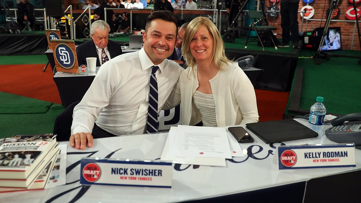 SECAUCUS, NJ - JUNE 03: New York Yankees team reps Nick Swisher and Kelly Rodman pose for a photo prior to the 2019 Major League Baseball Draft at Studio 42 at the MLB Network on Monday, June 3, 2019 in Secaucus, New Jersey. / Alex Trautwig/MLB Photos via Getty Images
