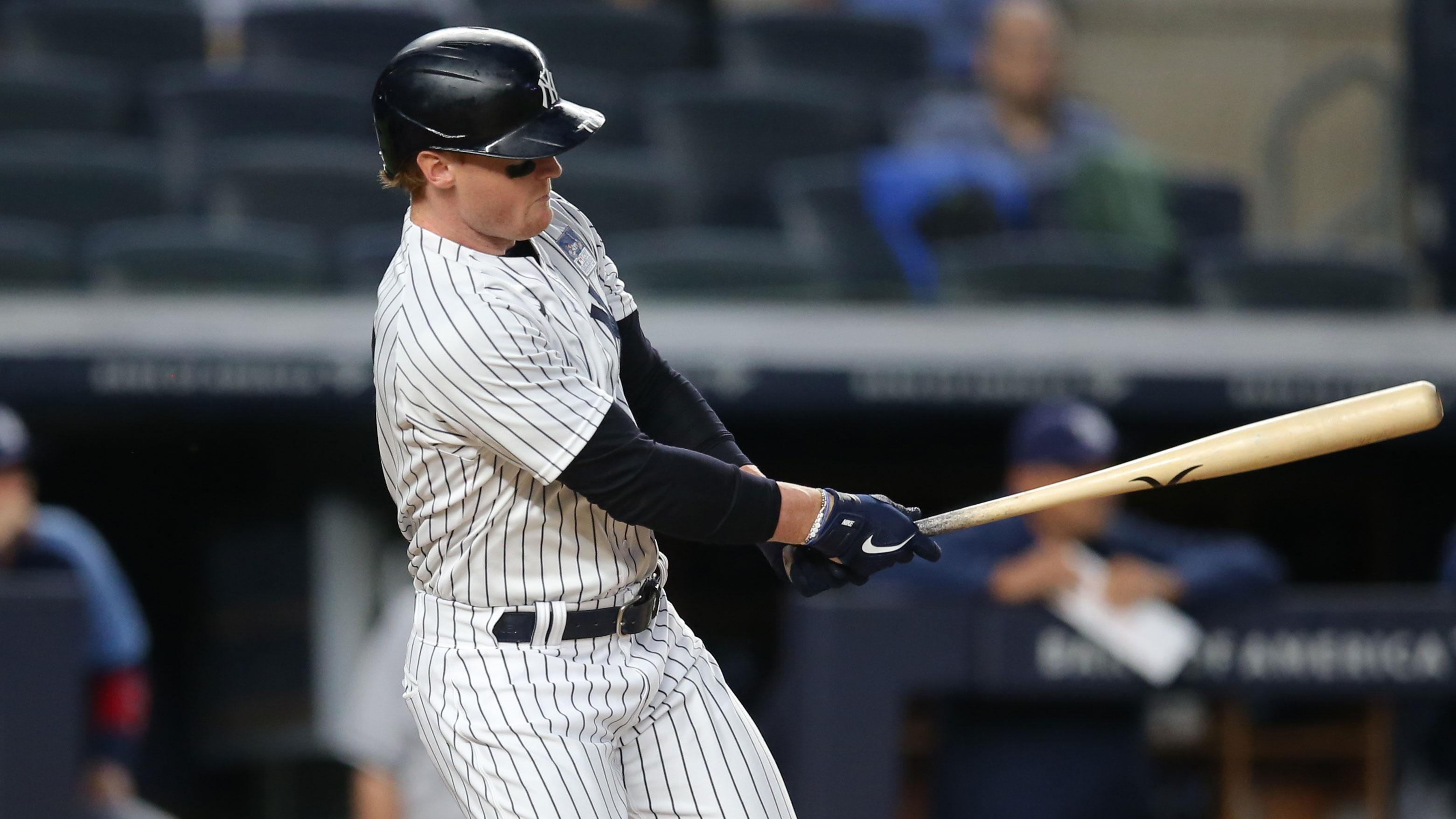 Jun 2, 2021; Bronx, New York, USA; New York Yankees right fielder Clint Frazier (77) follows through on a two run single against the Tampa Bay Rays during the fourth inning at Yankee Stadium. / Brad Penner-USA TODAY Sports