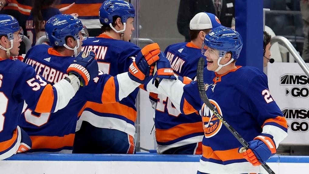 Apr 12, 2023; Elmont, New York, USA; New York Islanders right wing Hudson Fasching (20) celebrates his goal against the Montreal Canadiens with teammates during the first period at UBS Arena. / Brad Penner-USA TODAY Sports