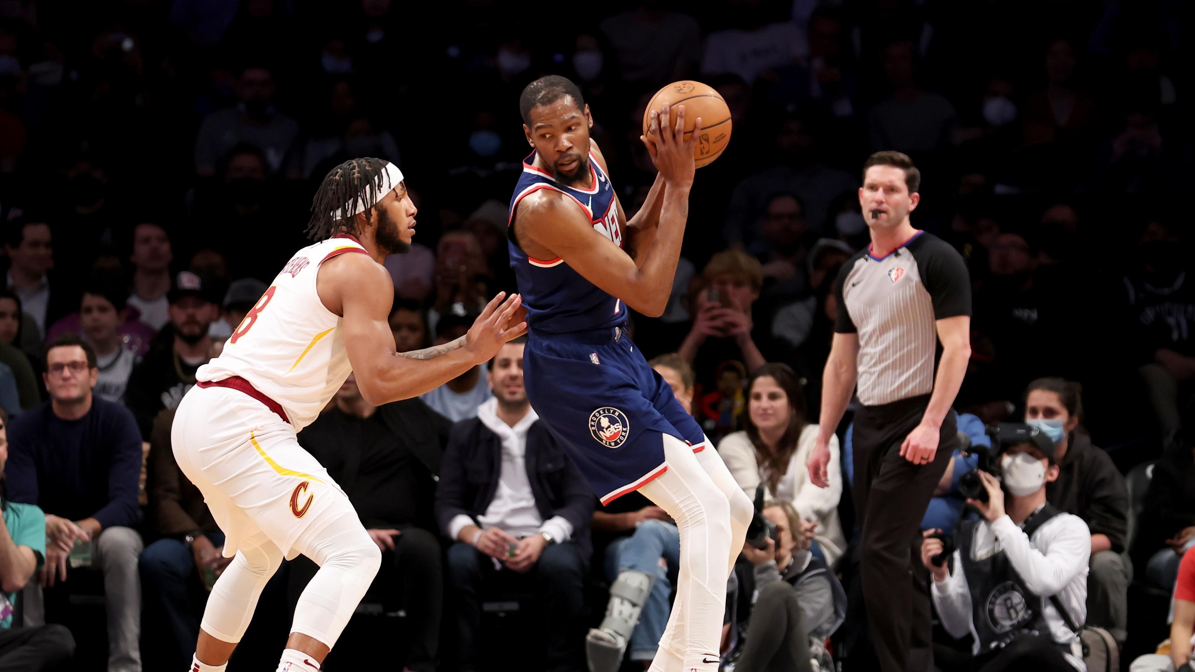 Apr 8, 2022; Brooklyn, New York, USA; Brooklyn Nets forward Kevin Durant (7) controls the ball against Cleveland Cavaliers forward Lamar Stevens (8) during the first quarter at Barclays Center. Mandatory Credit: Brad Penner-USA TODAY Sports / © Brad Penner-USA TODAY Sports