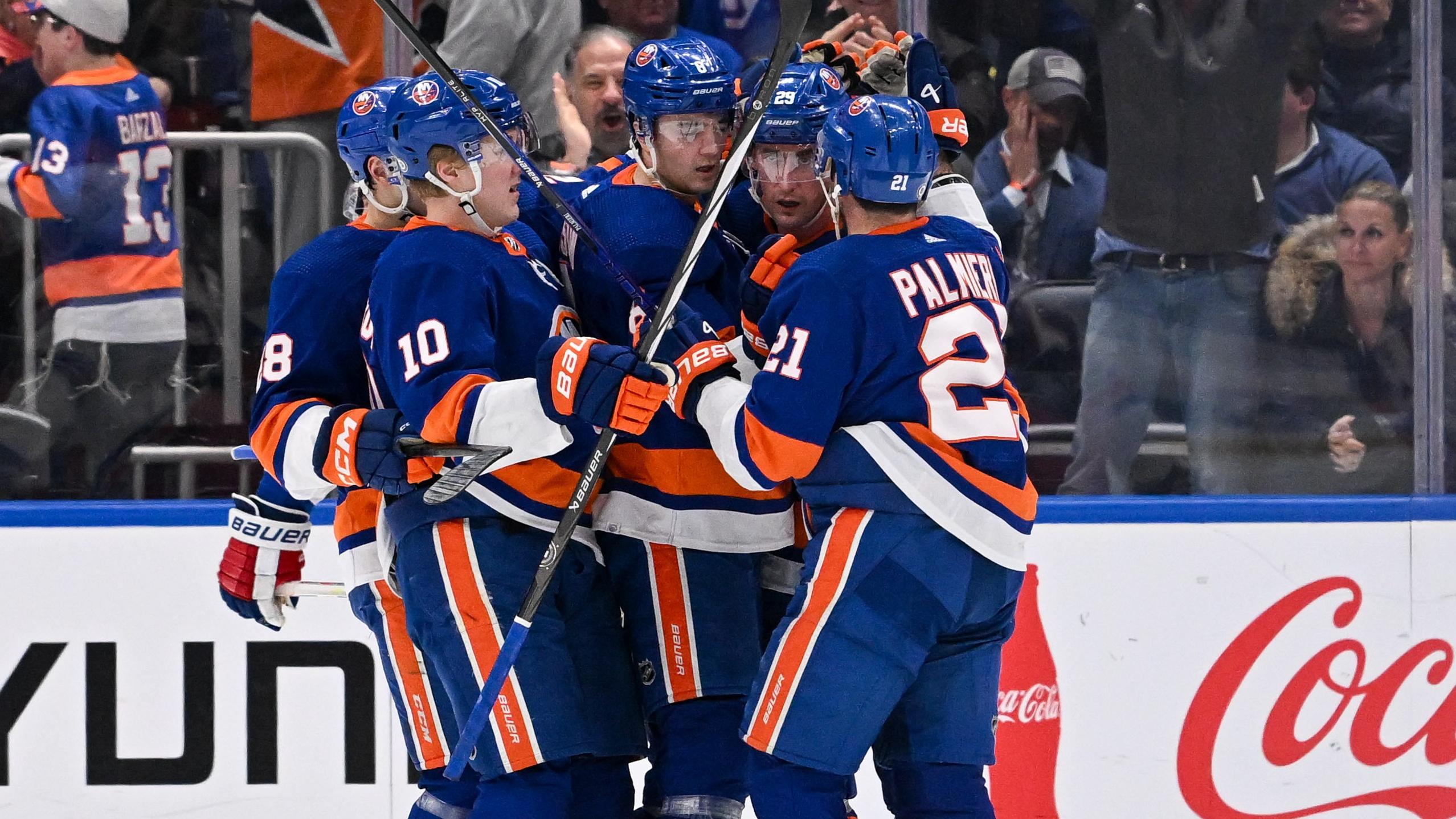 New York Islanders center Kyle Palmieri (21) celebrates his goal against the New York Rangers during the first period at UBS Arena / Dennis Schneidler - USA TODAY Sports