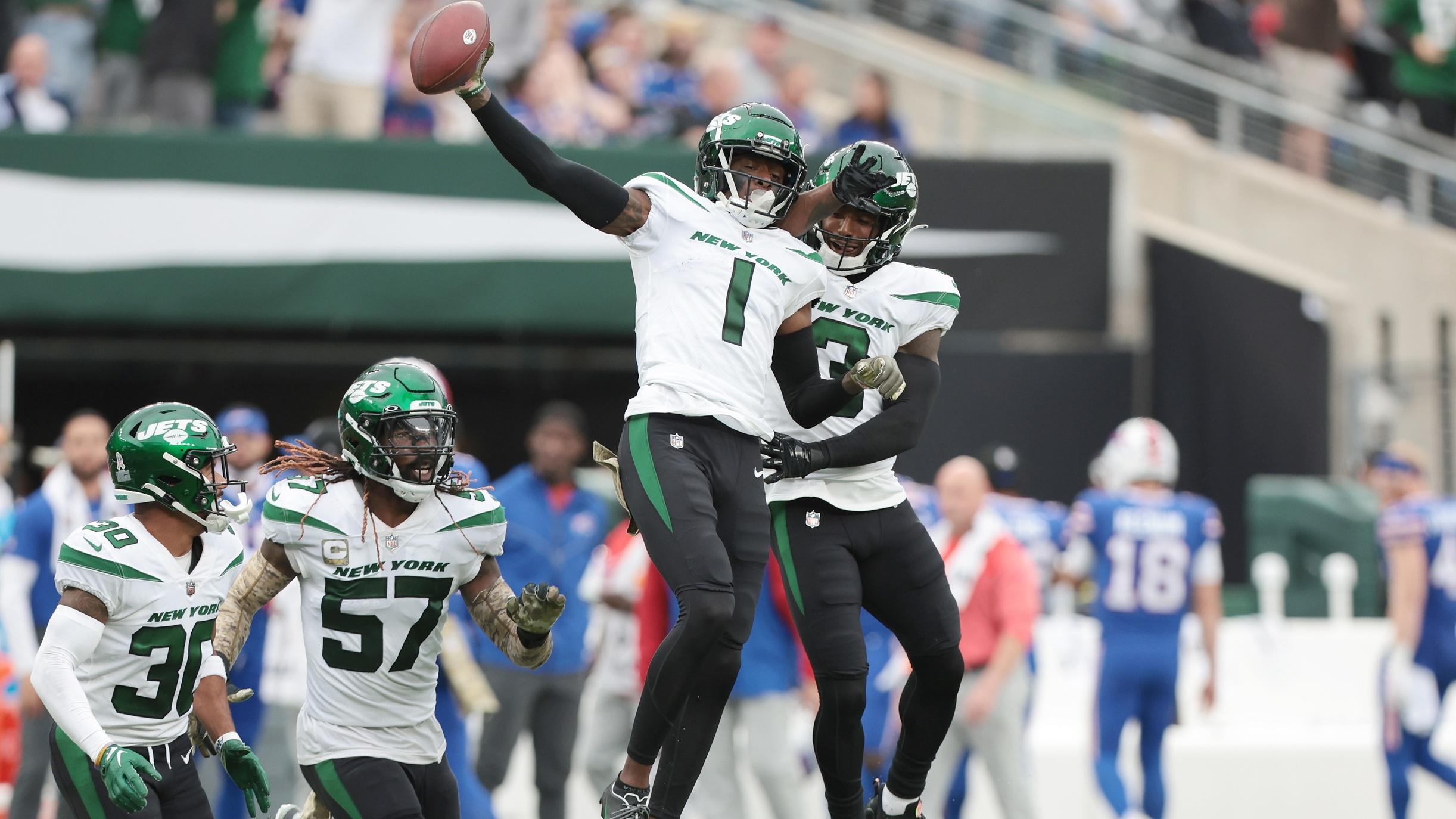 Nov 6, 2022; East Rutherford, New Jersey, USA; New York Jets cornerback Sauce Gardner (1) celebrates his interception with teammates during the second half against the Buffalo Bills at MetLife Stadium. / Vincent Carchietta-USA TODAY Sports